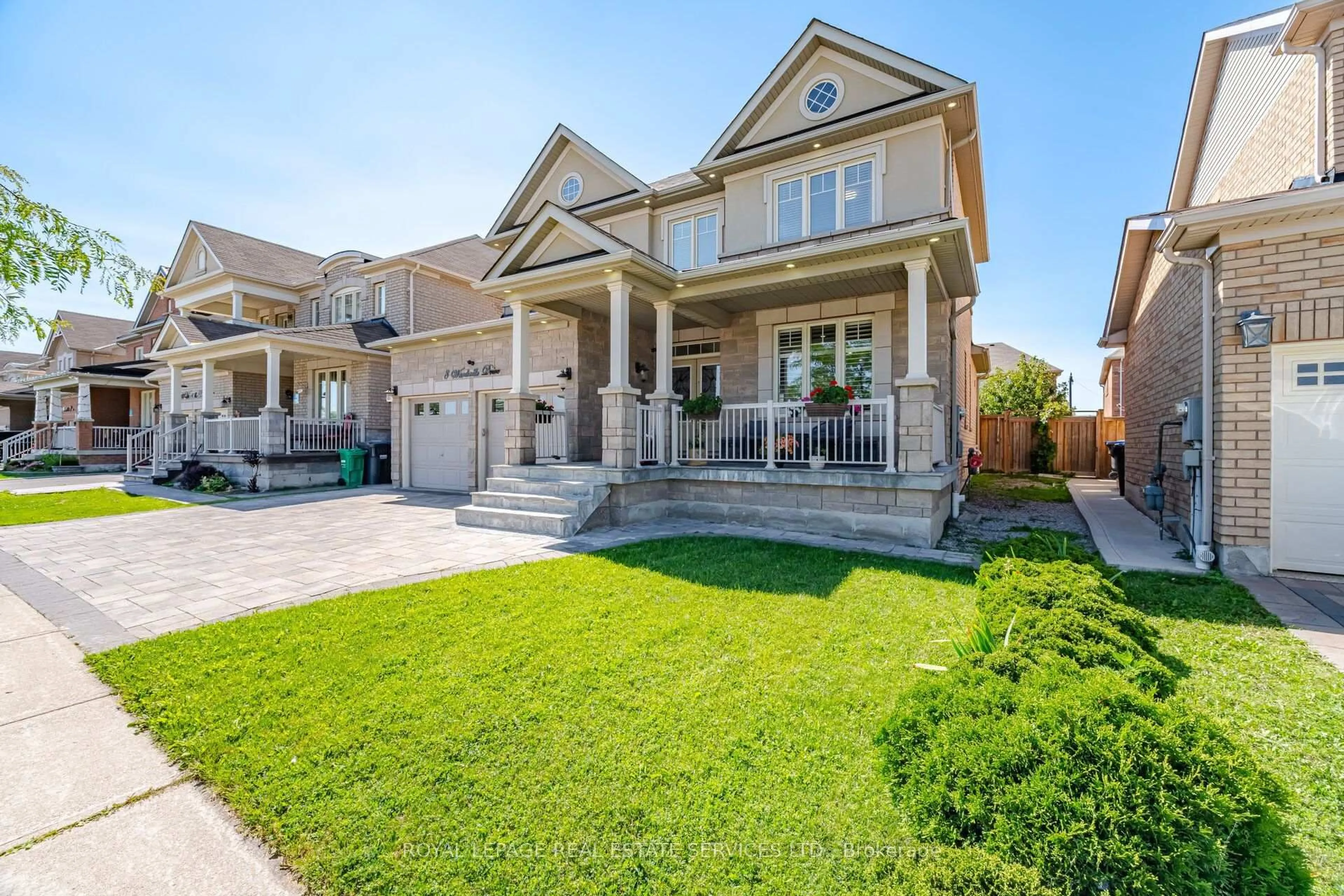 Home with brick exterior material, street for 8 Wardsville Dr, Brampton Ontario L6Y 0T7