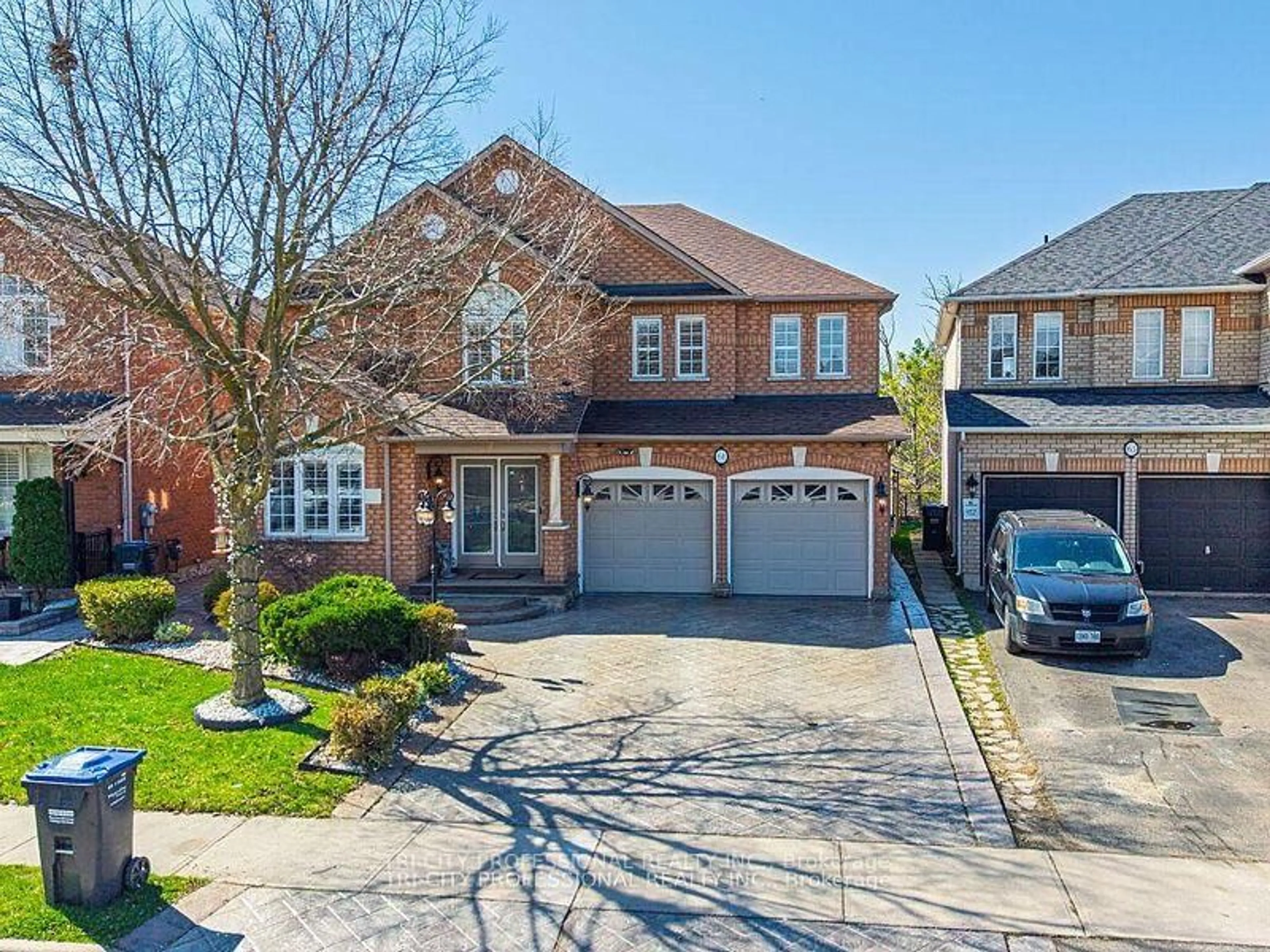 Home with brick exterior material, street for 61 Woodvalley Dr, Brampton Ontario L7A 1Z3