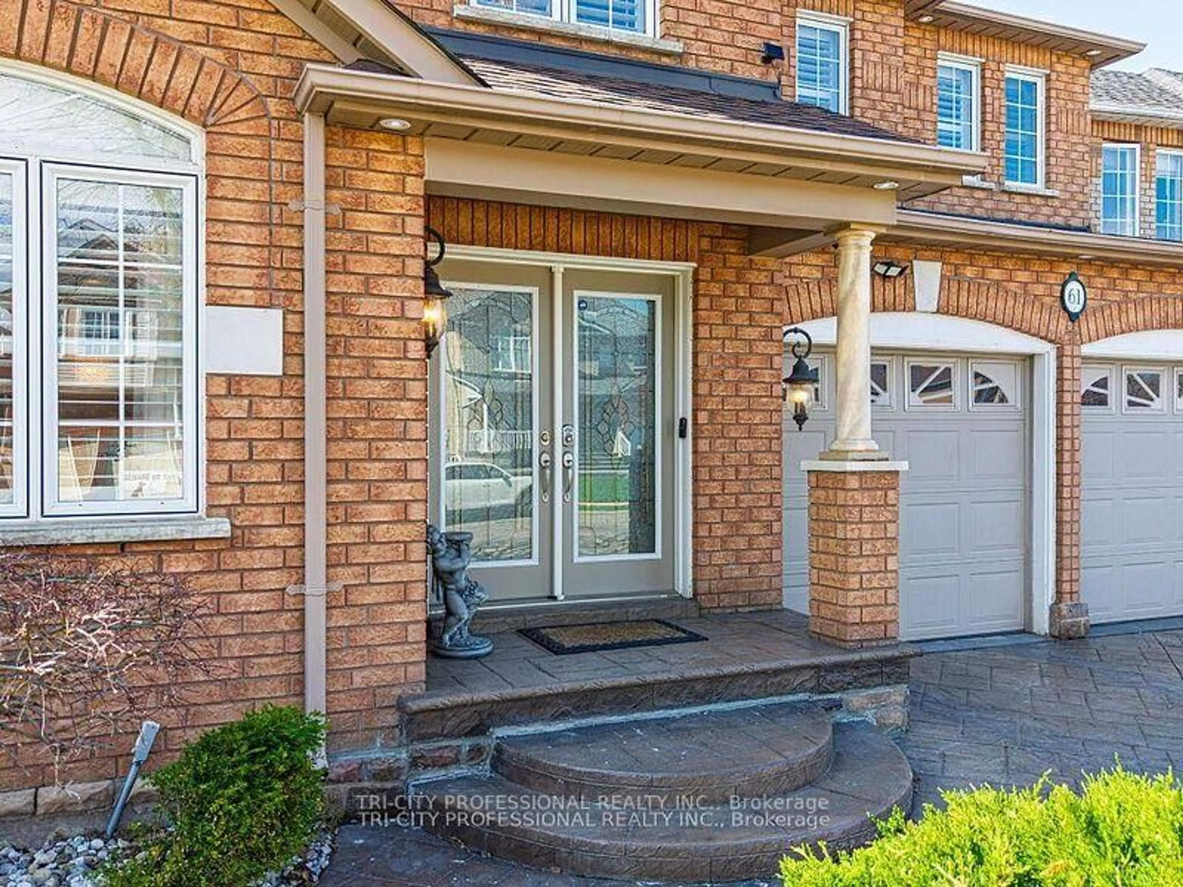 Home with brick exterior material, street for 61 Woodvalley Dr, Brampton Ontario L7A 1Z3