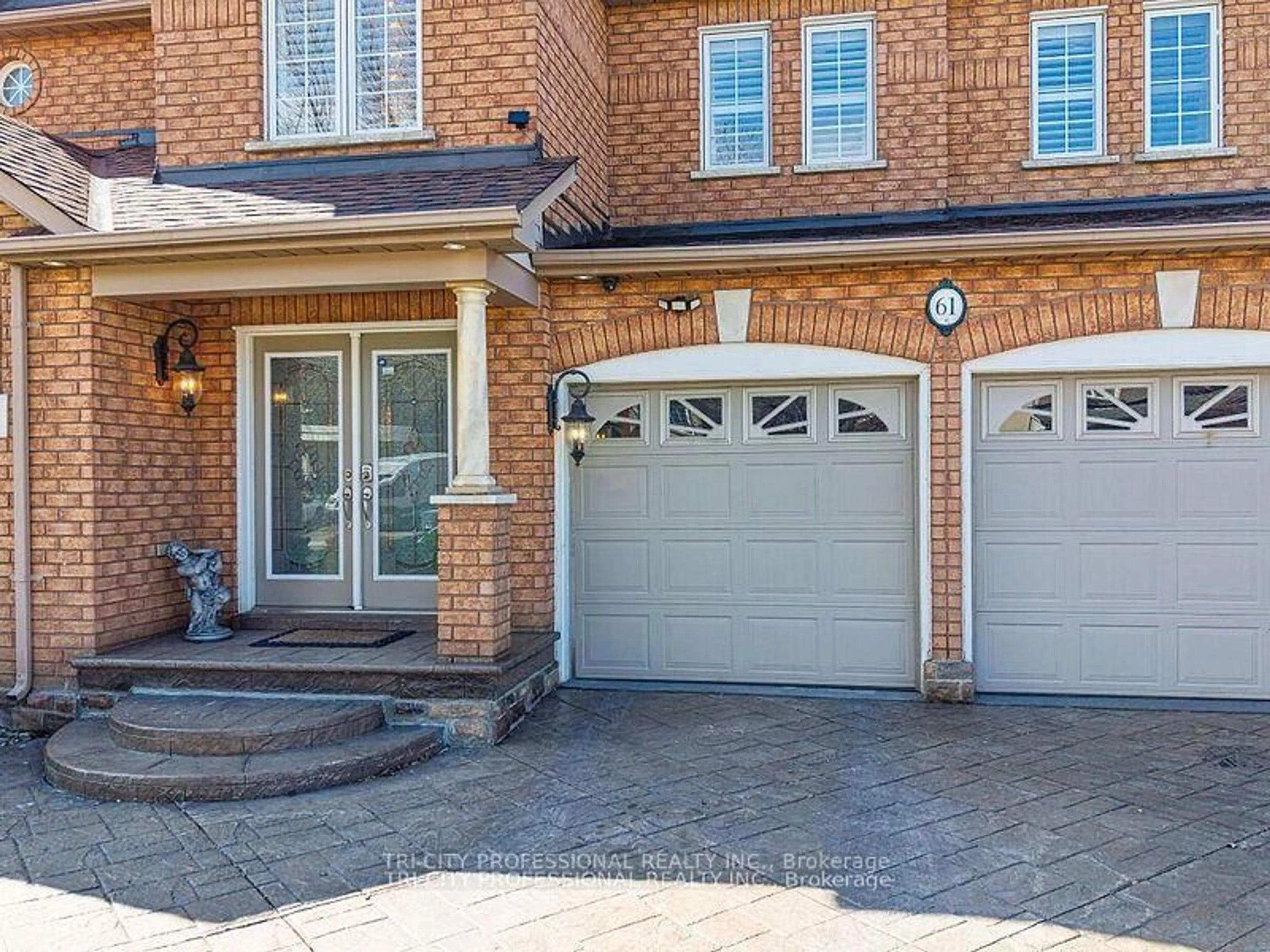 Home with brick exterior material, street for 61 Woodvalley Dr, Brampton Ontario L7A 1Z3