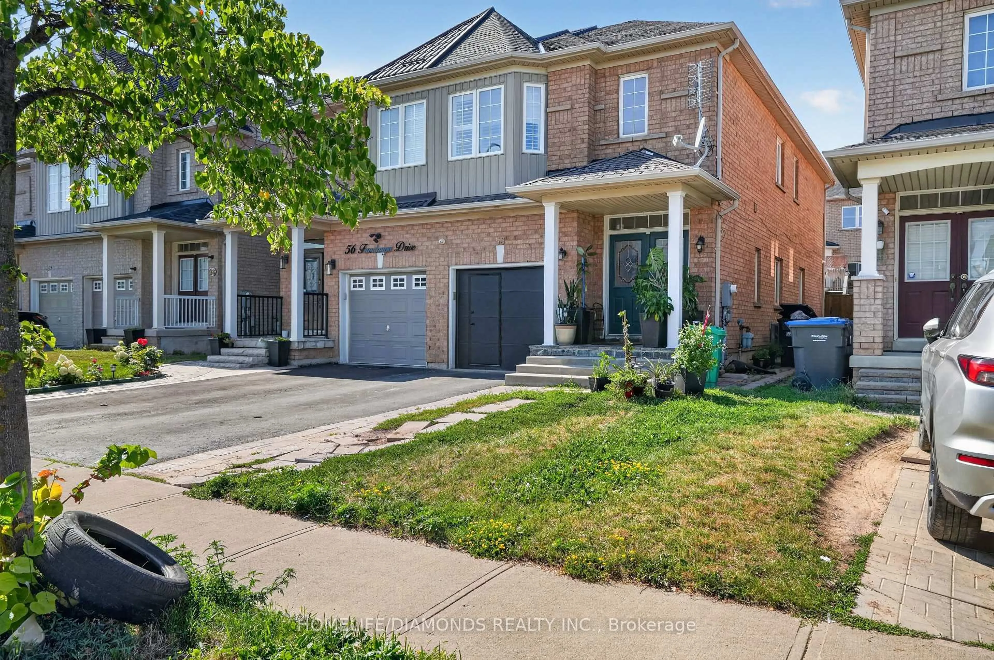 Home with brick exterior material, street for 58 Fandango Dr, Brampton Ontario L6X 0R4