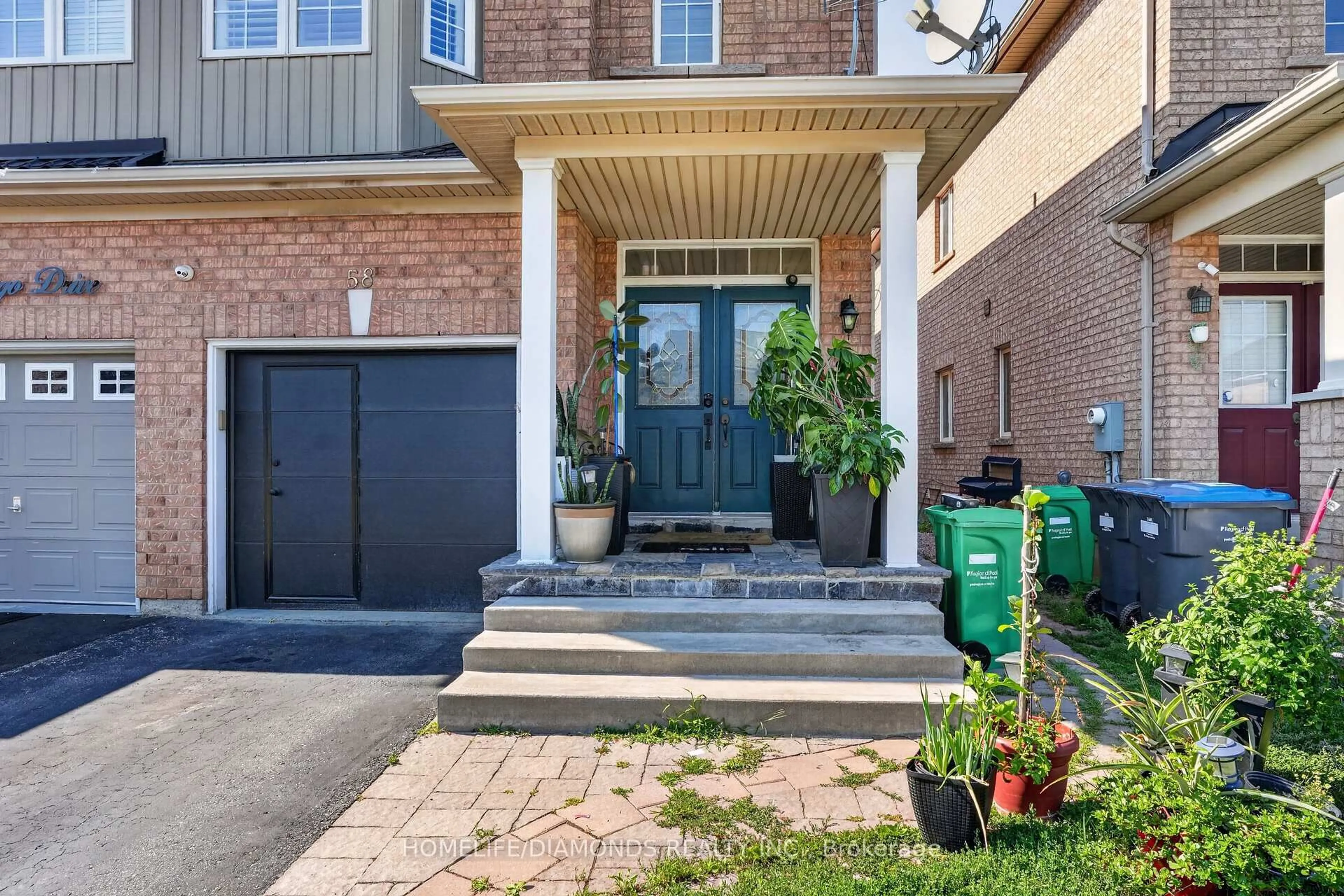 Home with brick exterior material, street for 58 Fandango Dr, Brampton Ontario L6X 0R4