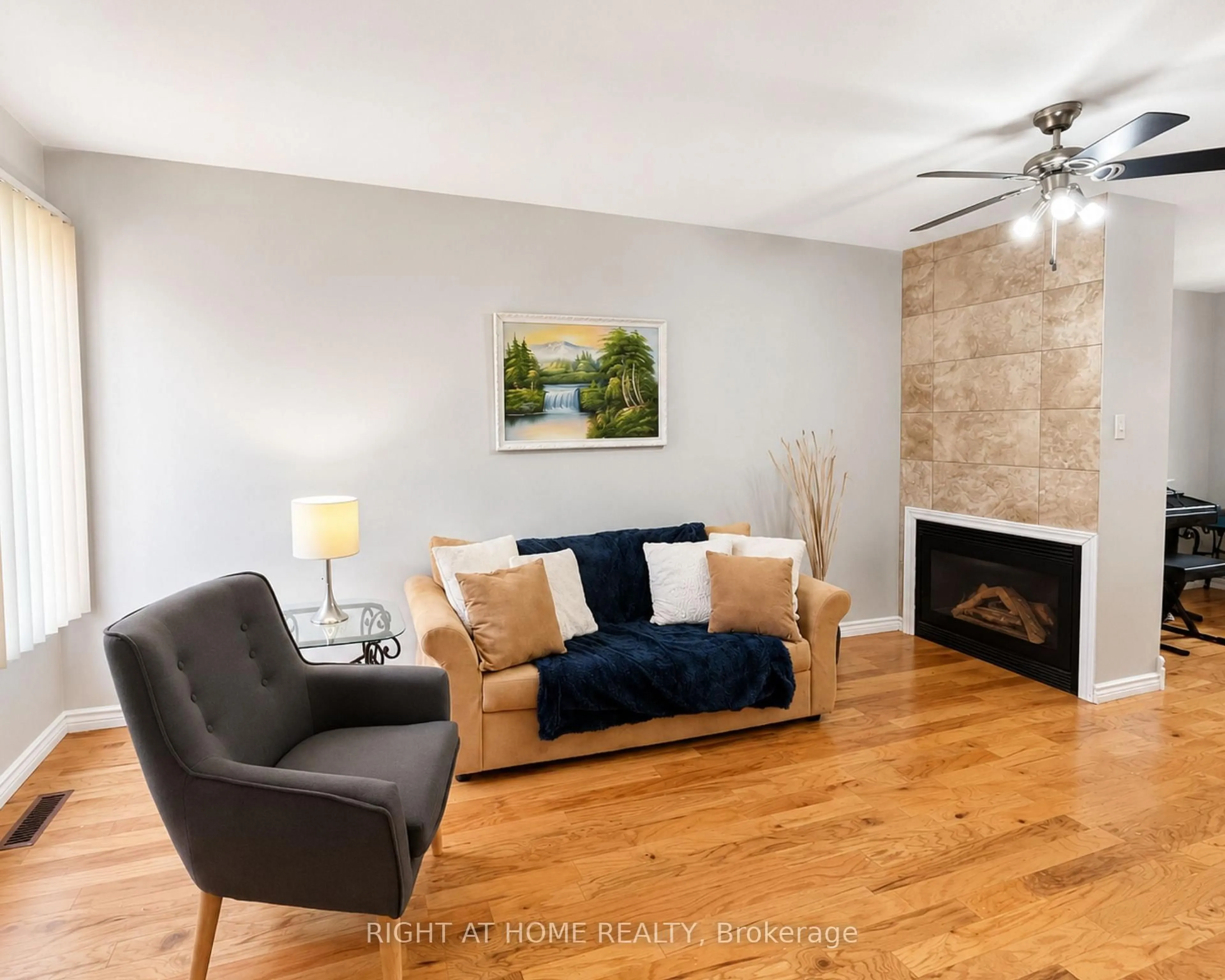 Living room with furniture, wood/laminate floor for 10 Banner Rd, Brampton Ontario L6X 4K6