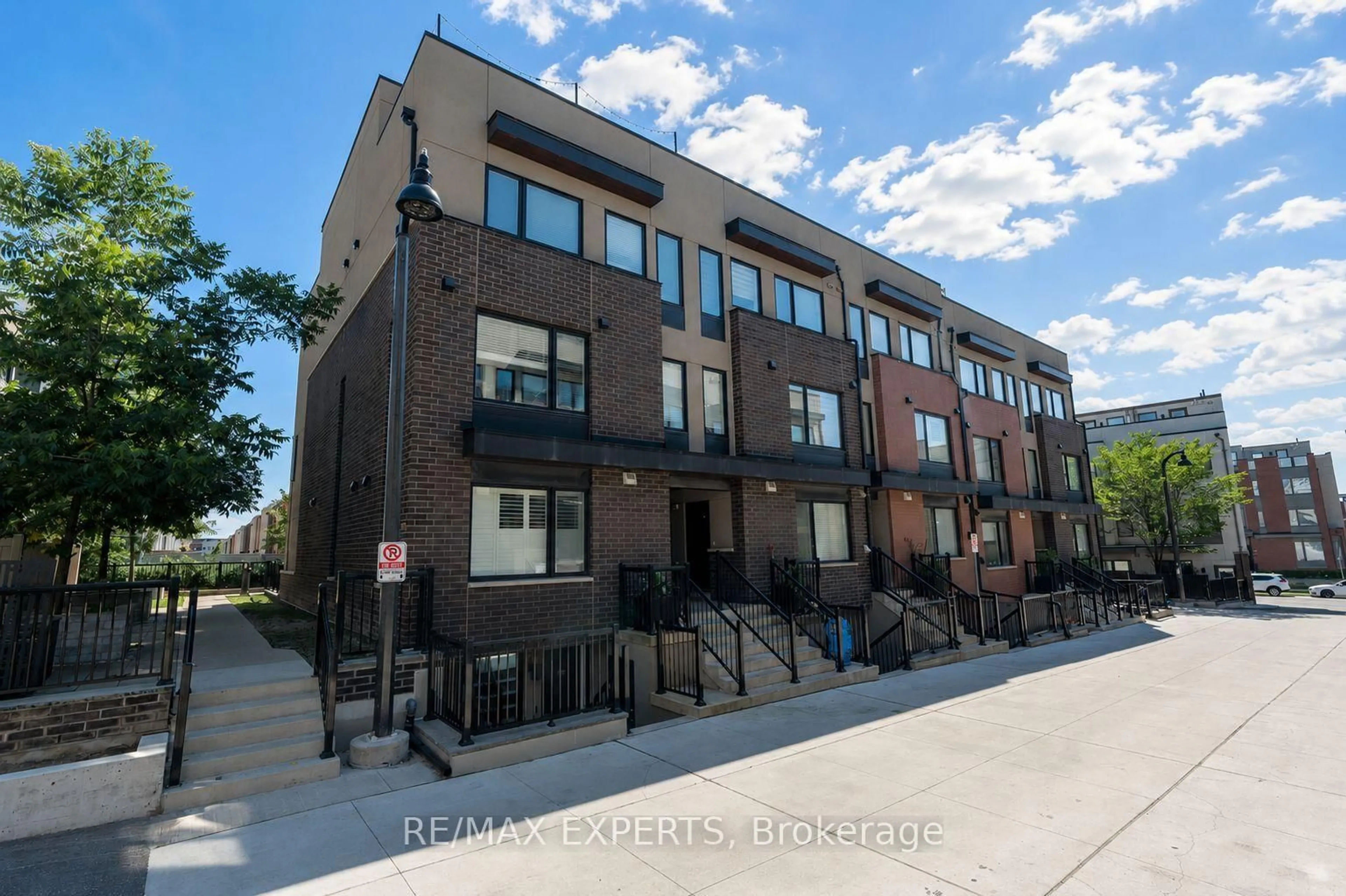 Home with brick exterior material, street for 142 William Duncan Rd #1, Toronto Ontario M3K 0C1
