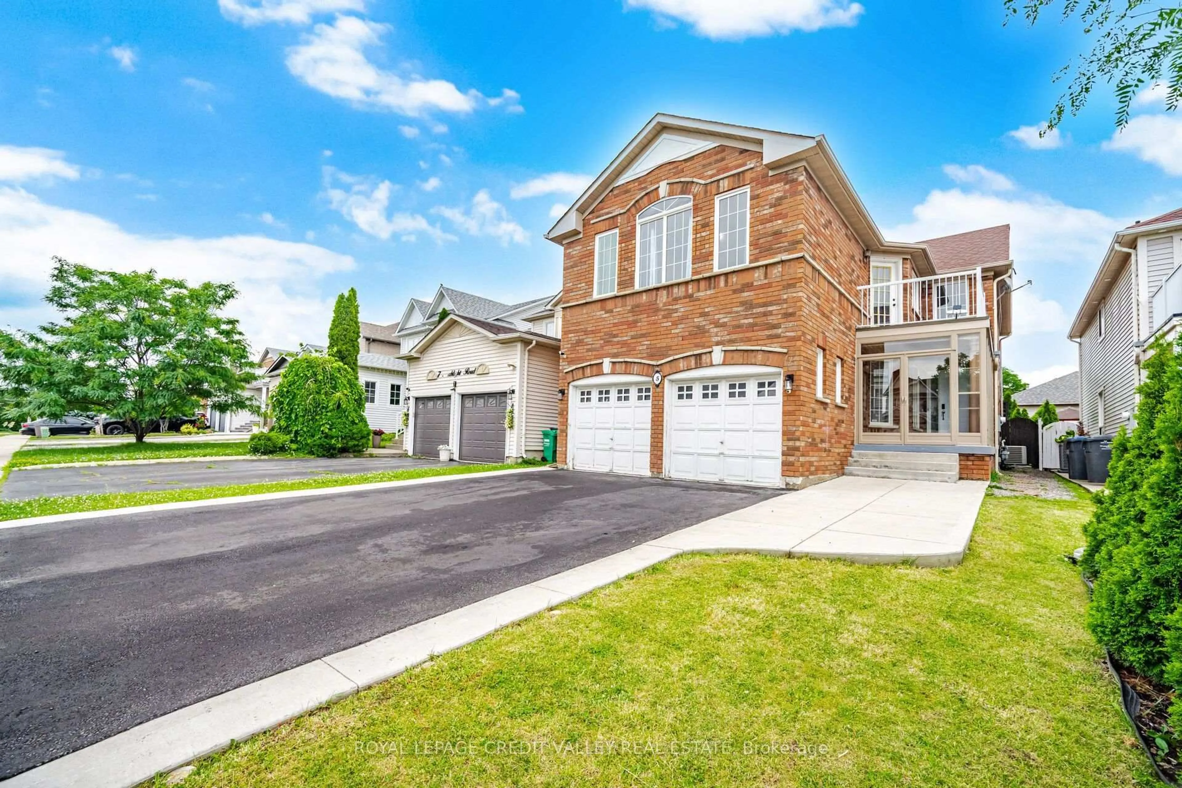 Home with brick exterior material, street for 5 Porchlight Rd, Brampton Ontario L6X 4S3