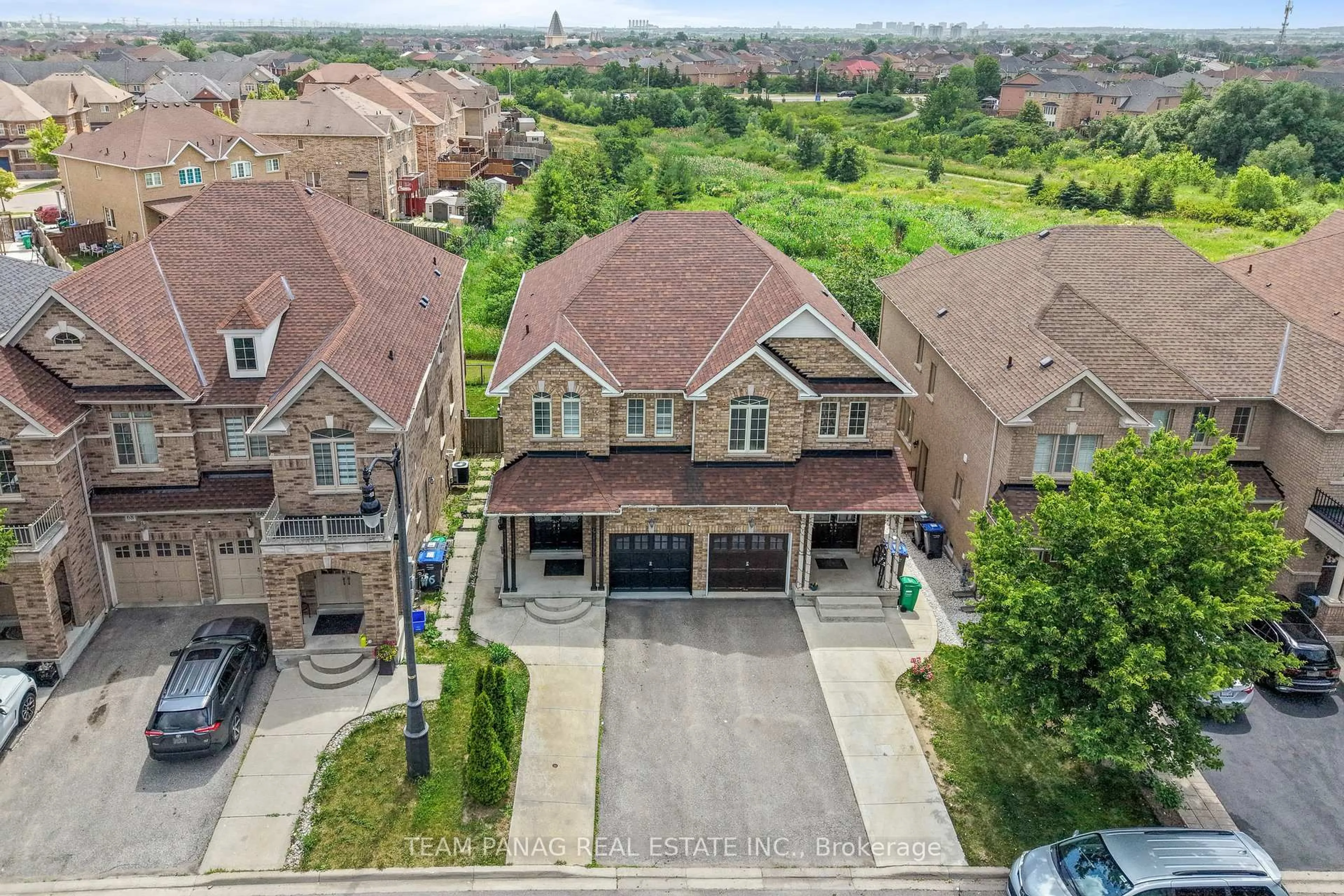 A pic from outside/outdoor area/front of a property/back of a property/a pic from drone, street for 64 Clearfield Dr, Brampton Ontario L6P 3J4