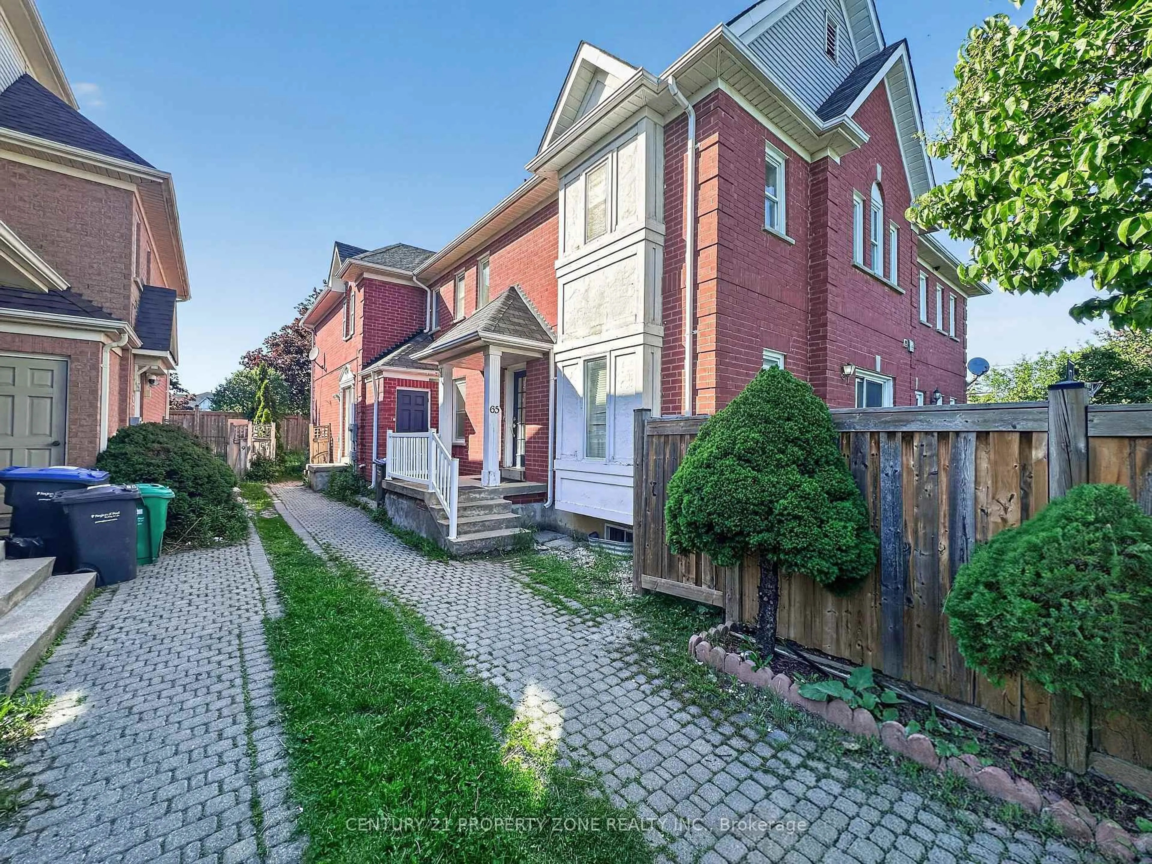 Home with brick exterior material, street for 65 Shady Pine Circ, Brampton Ontario L6R 1K3