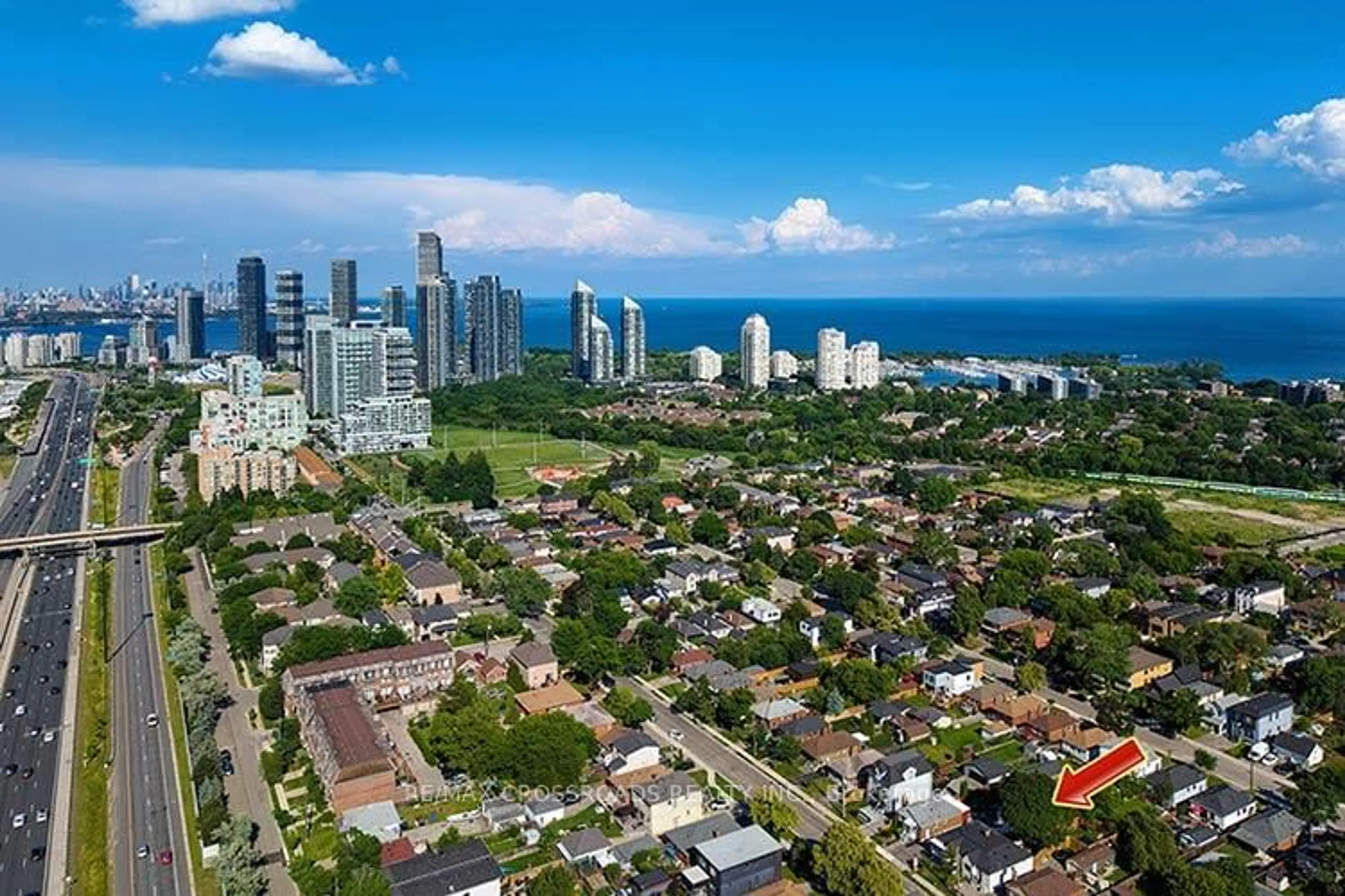 A pic from outside/outdoor area/front of a property/back of a property/a pic from drone, city buildings view from balcony for 65 Manitoba St, Toronto Ontario M8Y 1E1