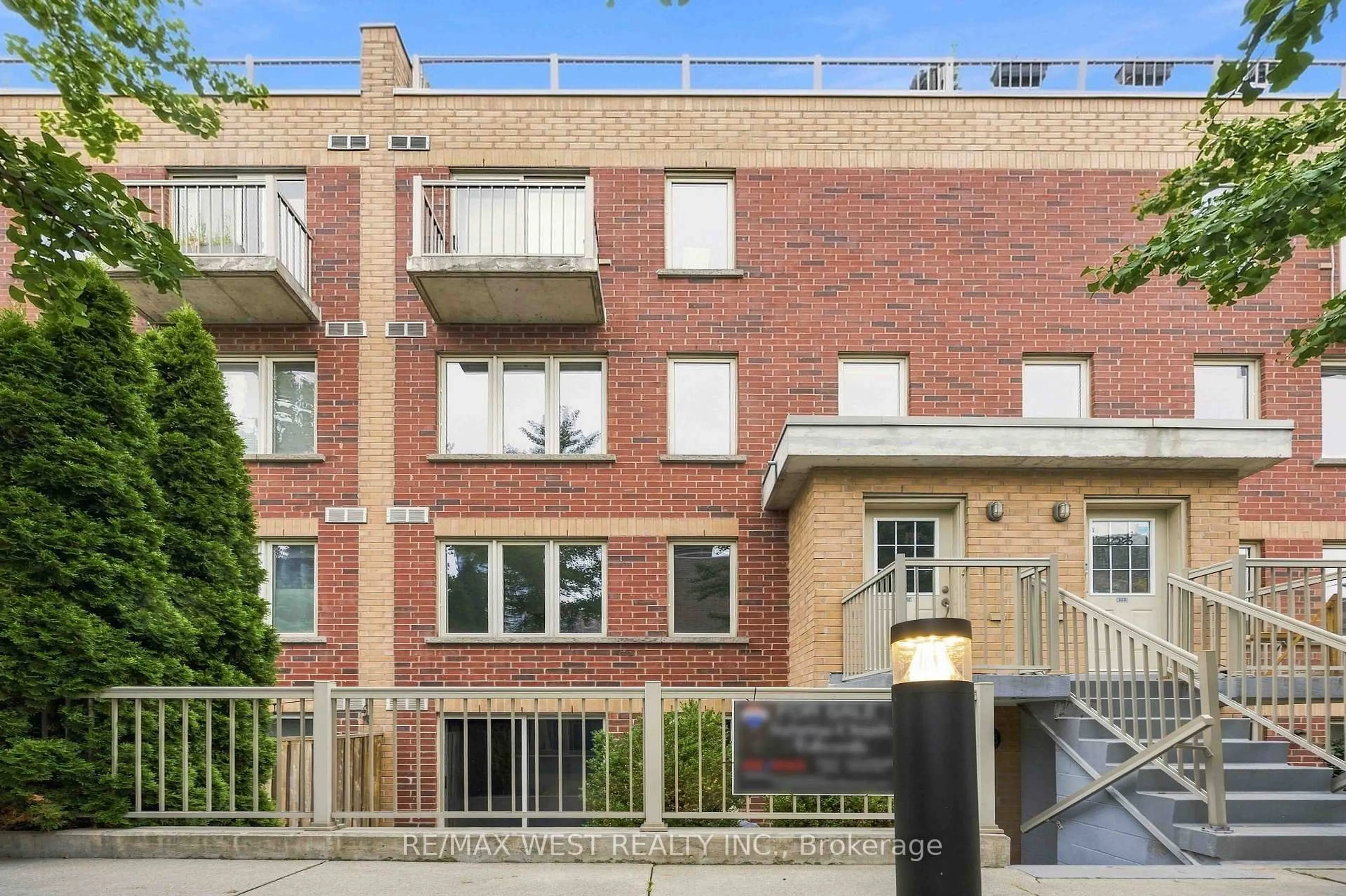 Home with brick exterior material, street for 20 Elsie Lane #122, Toronto Ontario M6P 3N9