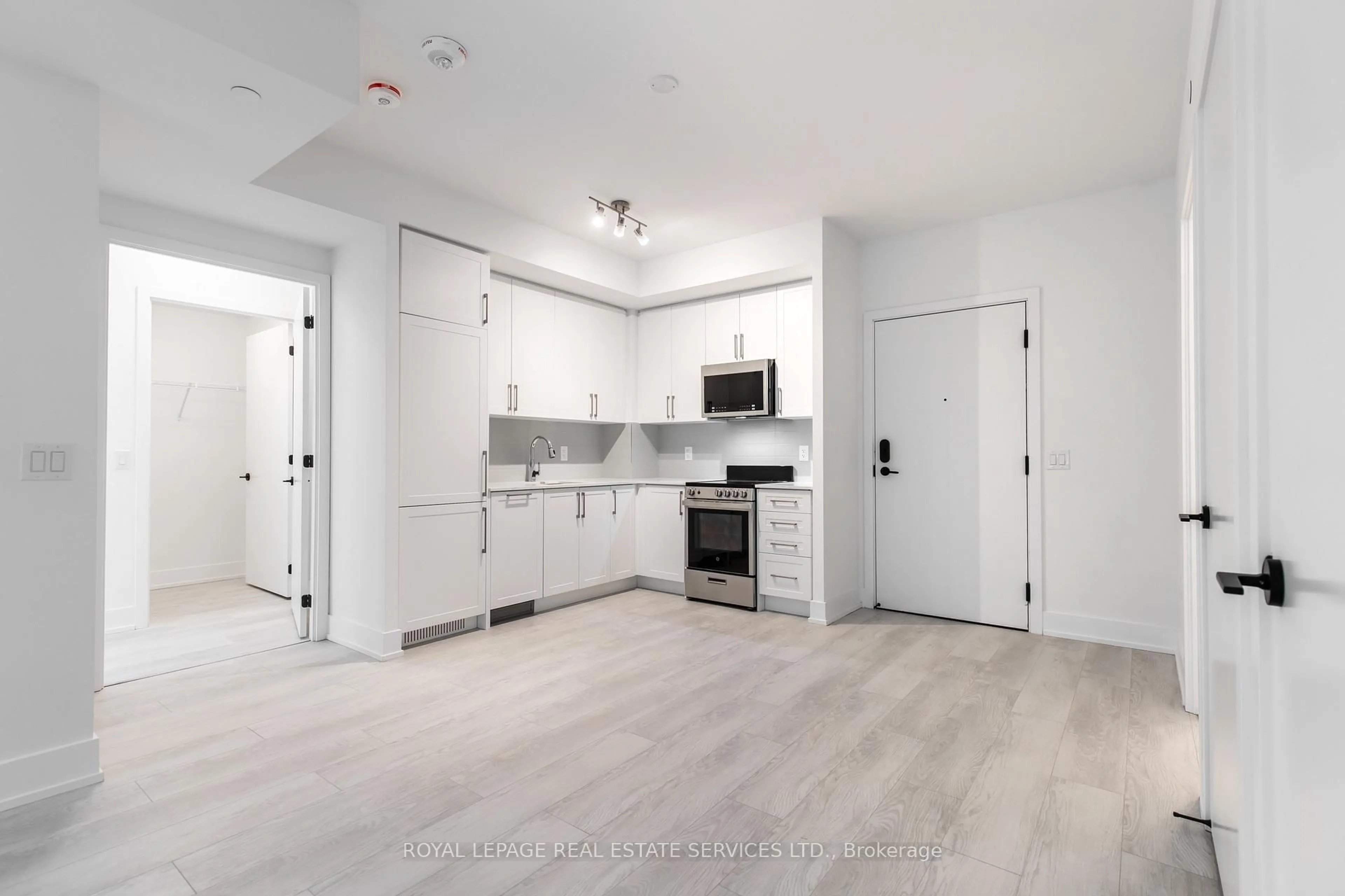 Open concept kitchen, unknown for 2450 Old Bronte Rd #325, Oakville Ontario L6M 5P6