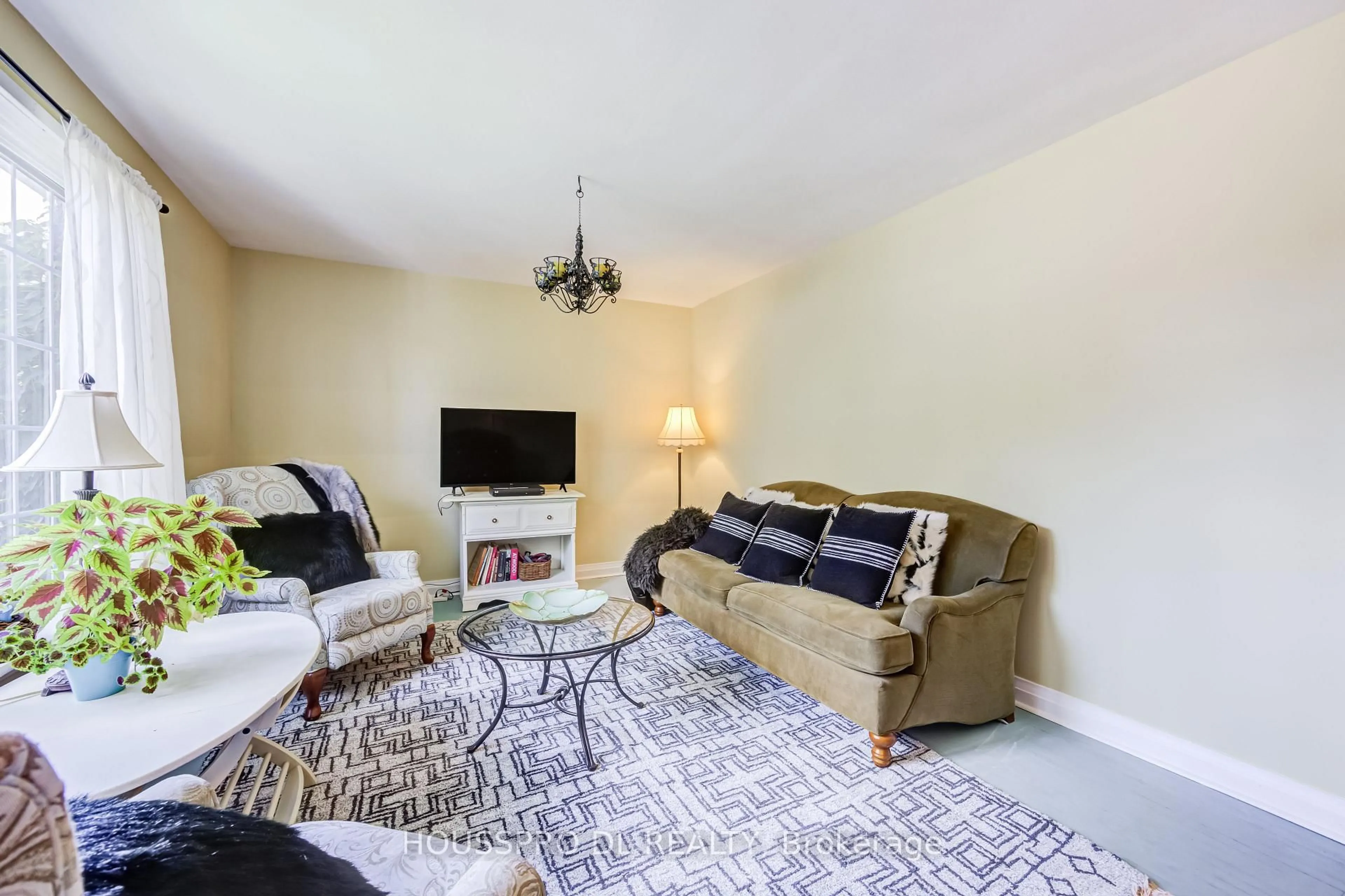 Living room with furniture, carpet floor for 42 Chalfont Rd, Toronto Ontario M9W 3S5
