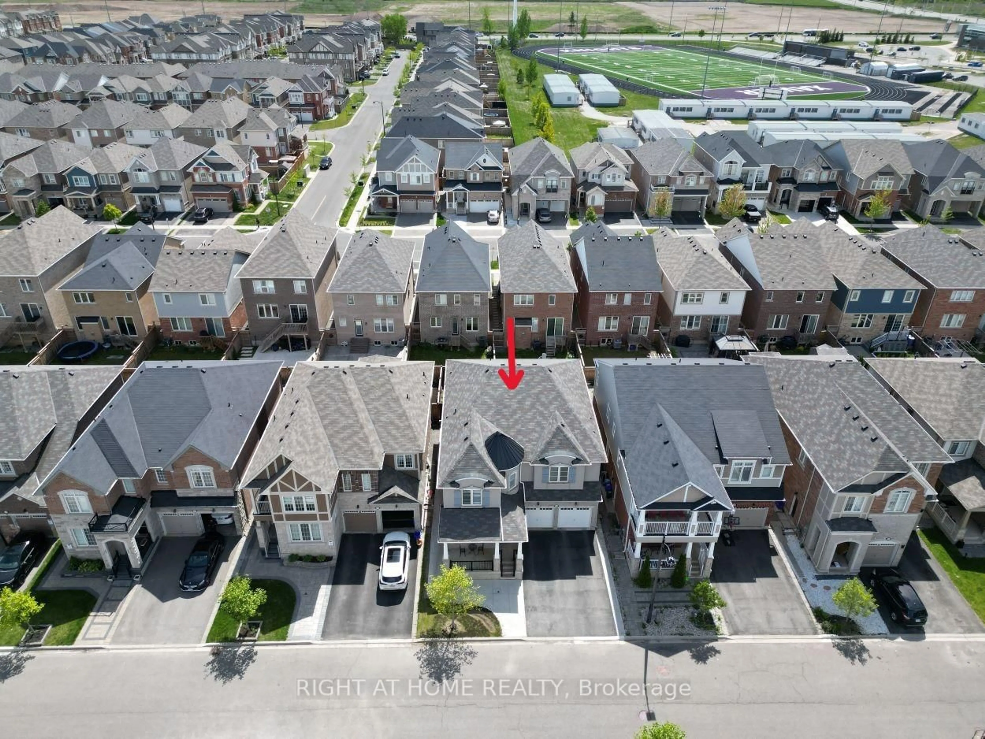 A pic from outside/outdoor area/front of a property/back of a property/a pic from drone, street for 1190 McEachern Crt, Milton Ontario L9E 1E5