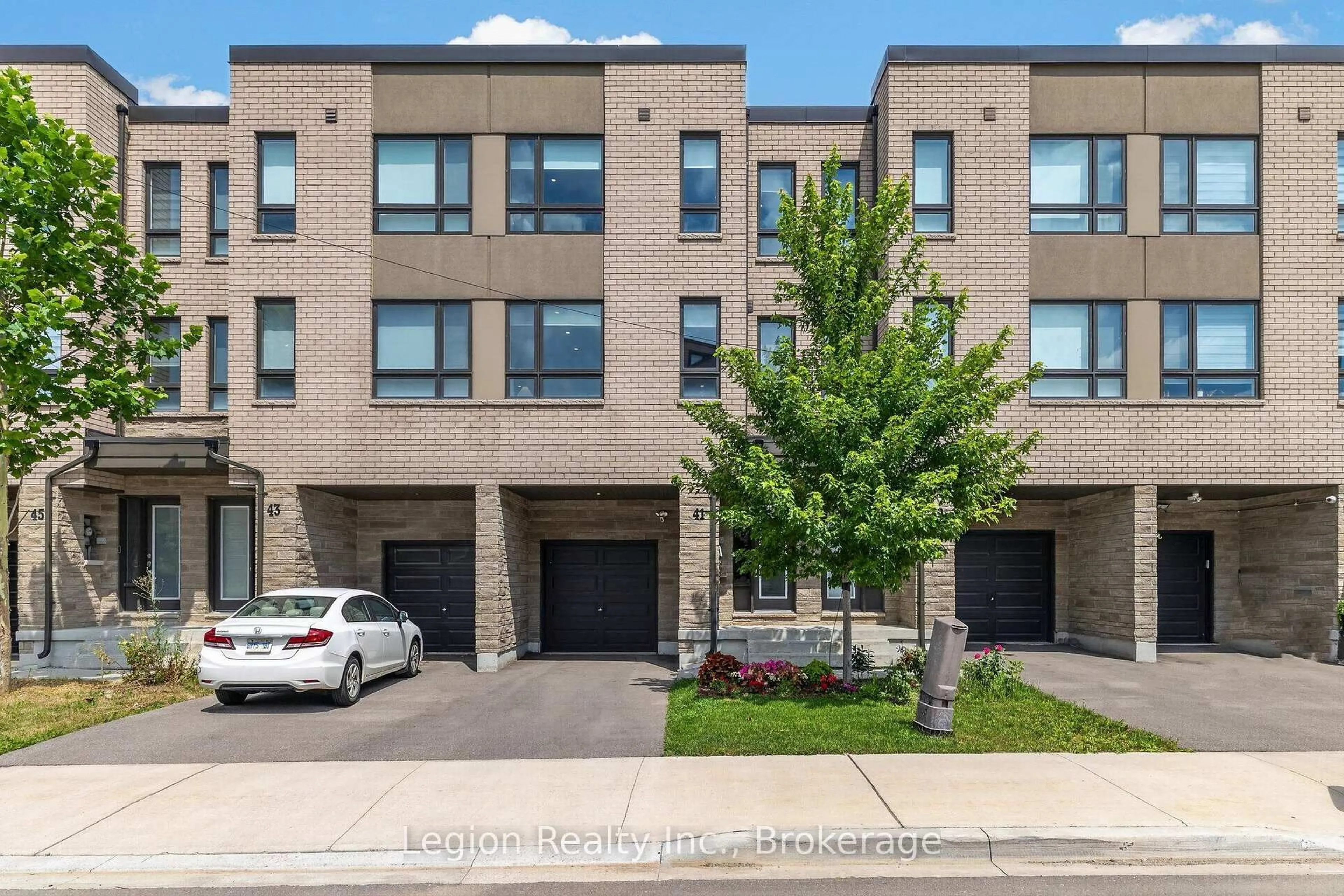 Home with brick exterior material, street for 41 Woodstream Dr, Toronto Ontario M9W 0G1