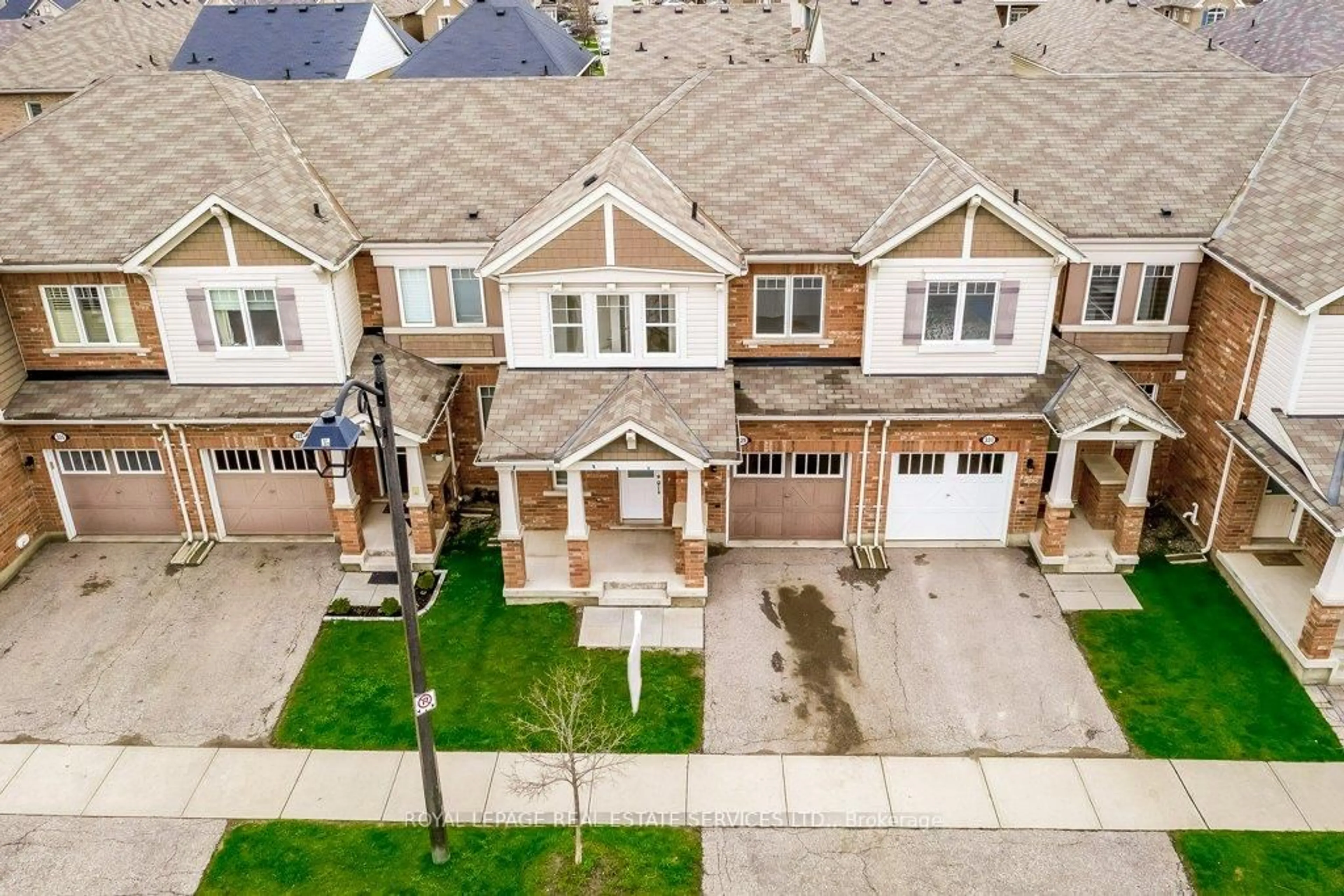 A pic from outside/outdoor area/front of a property/back of a property/a pic from drone, street for 329 Gooding Cres, Milton Ontario L9E 0A9