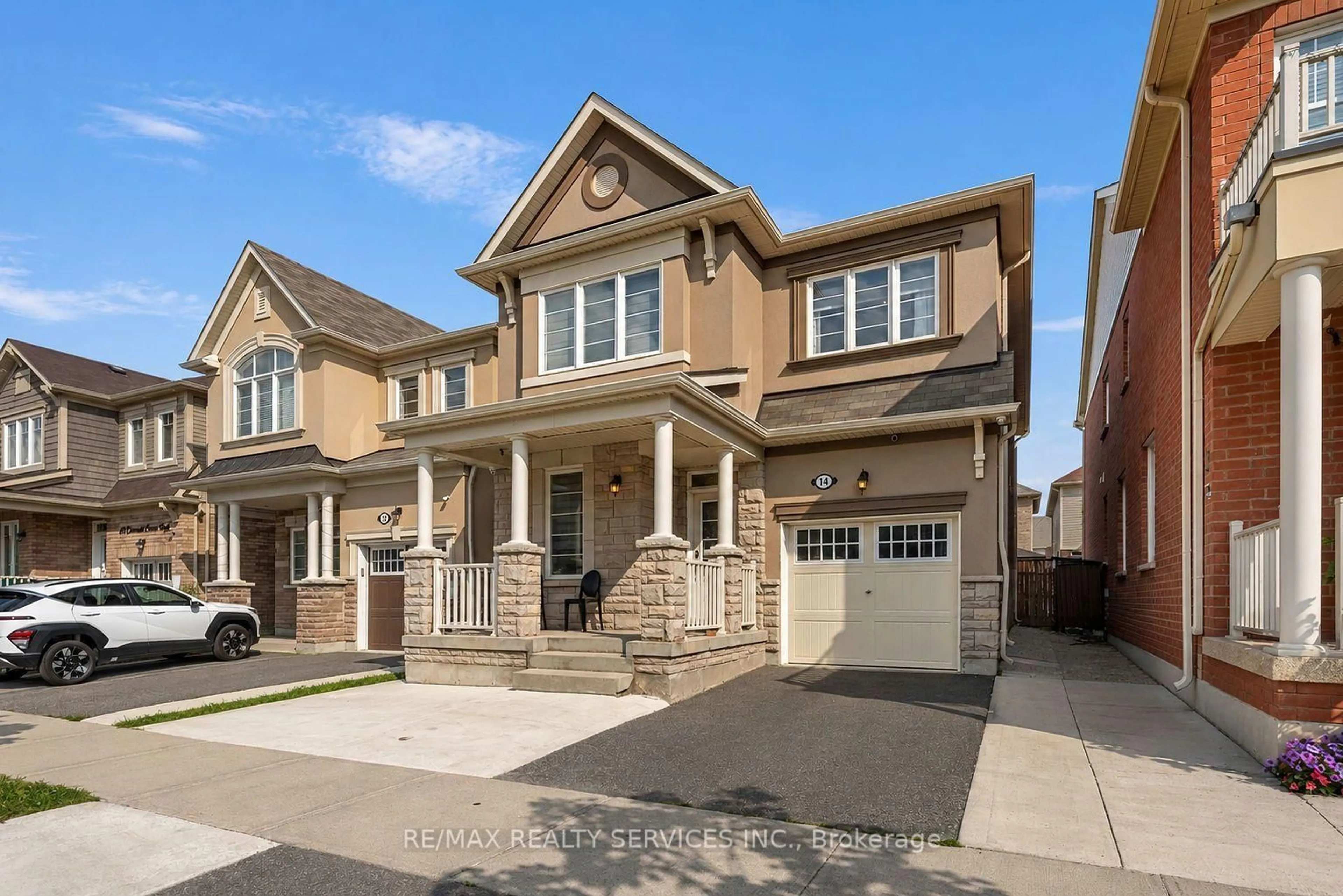 Home with brick exterior material, street for 14 Emerald Coast Tr, Brampton Ontario L7A 5A7