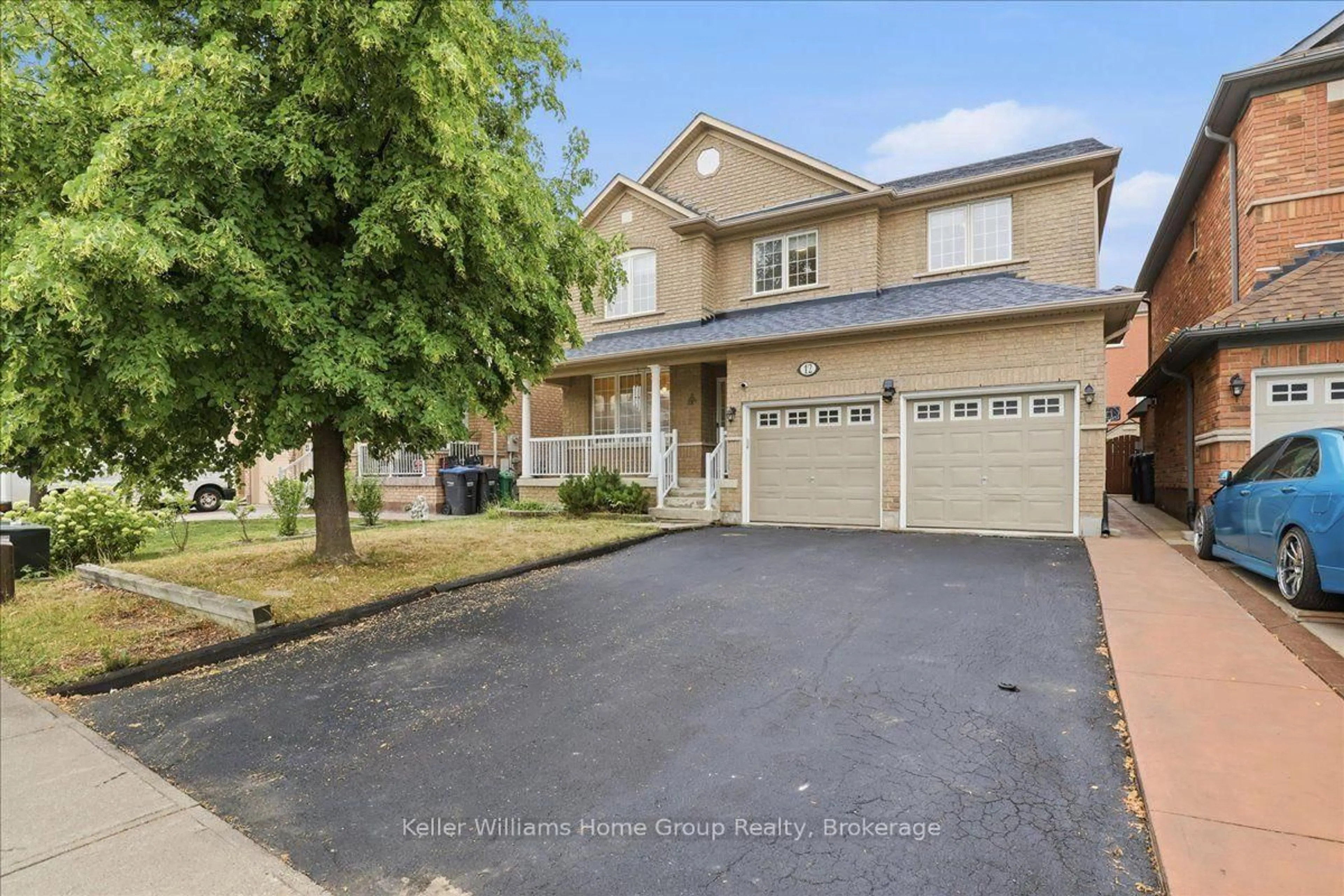 Home with brick exterior material, street for 12 Thorndale Rd, Brampton Ontario L6P 1H3