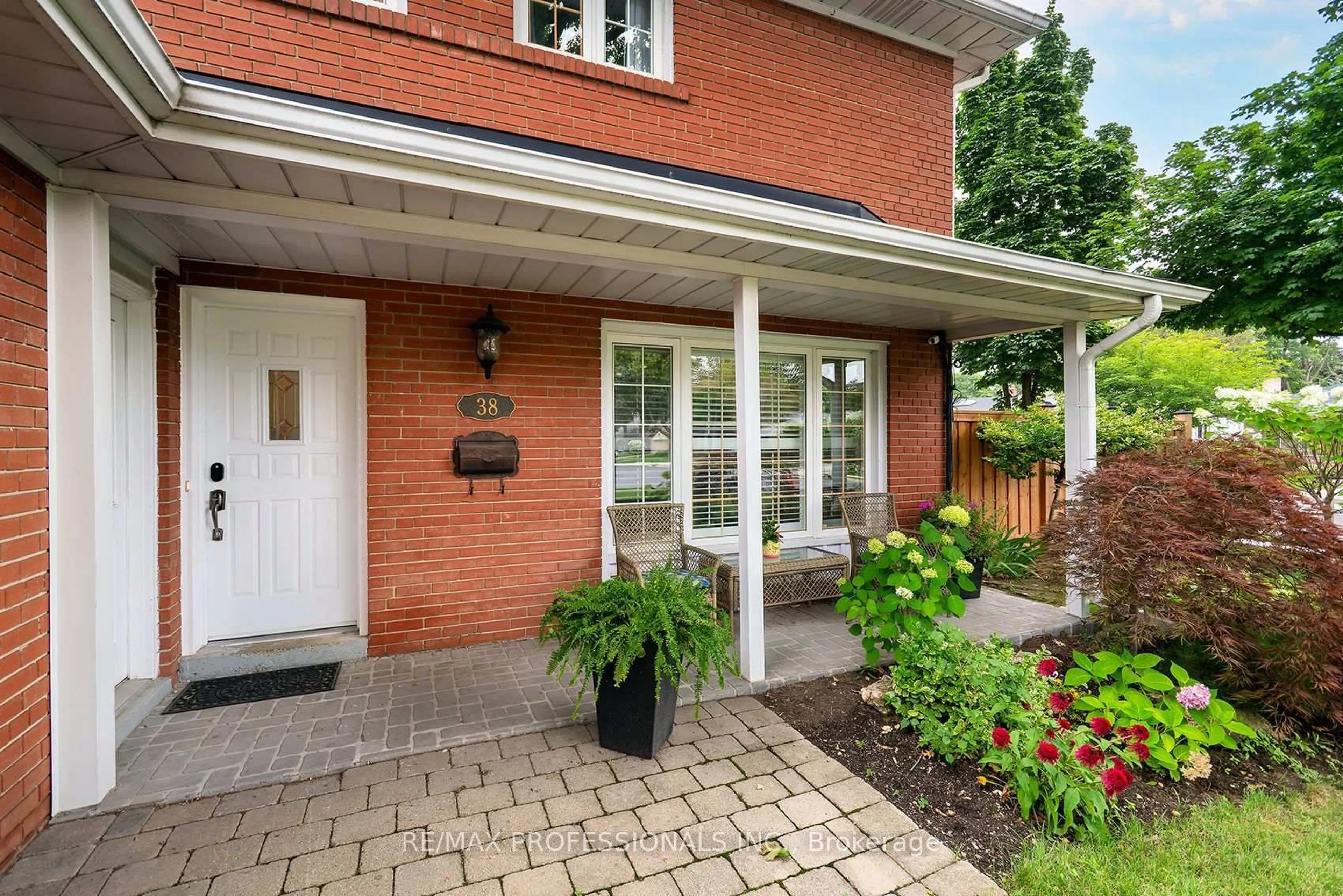 Home with brick exterior material, street for 38 Boxwood Rd, Toronto Ontario M9C 2W5