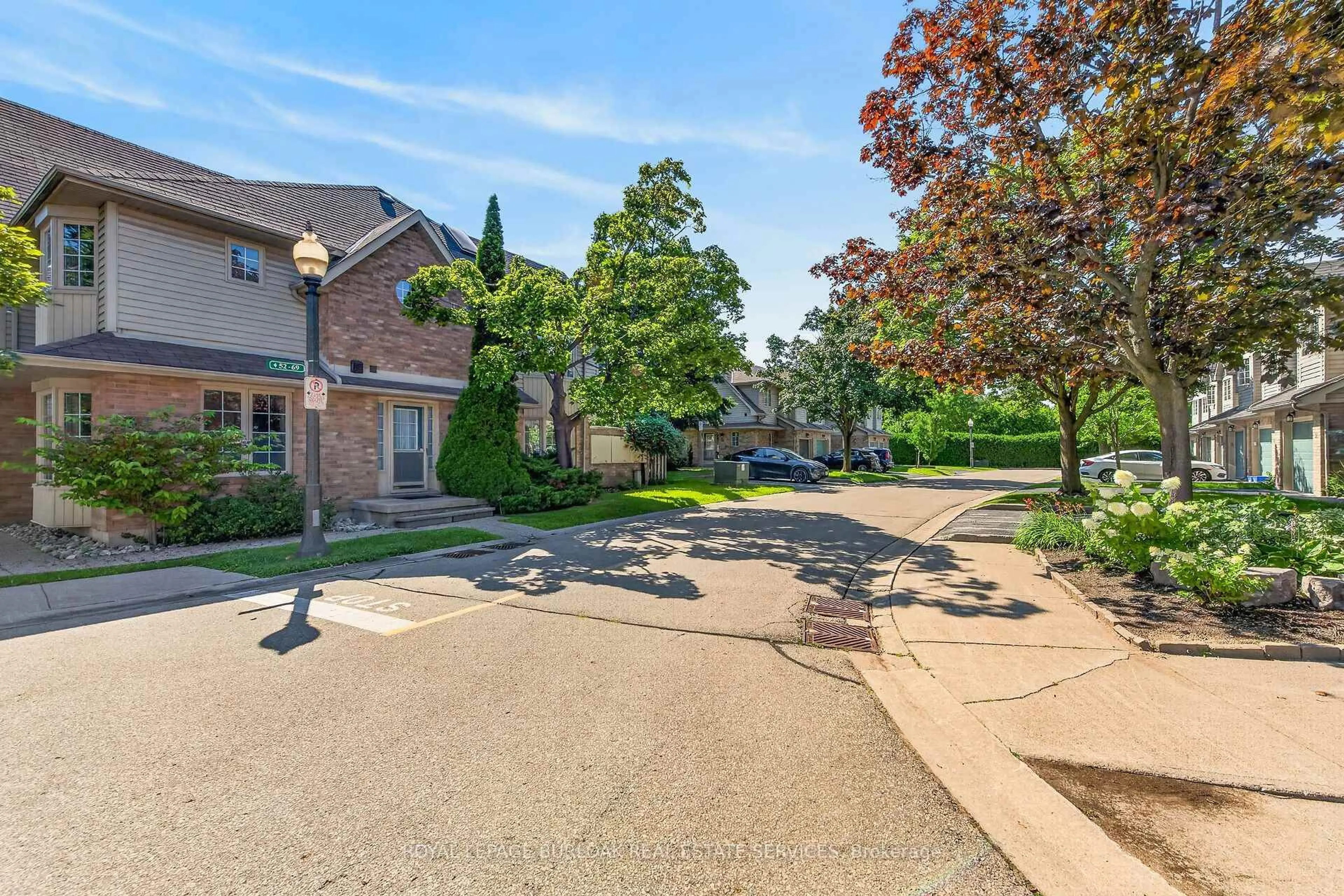 A pic from outside/outdoor area/front of a property/back of a property/a pic from drone, street for 3333 New St #72, Burlington Ontario L7N 1N1