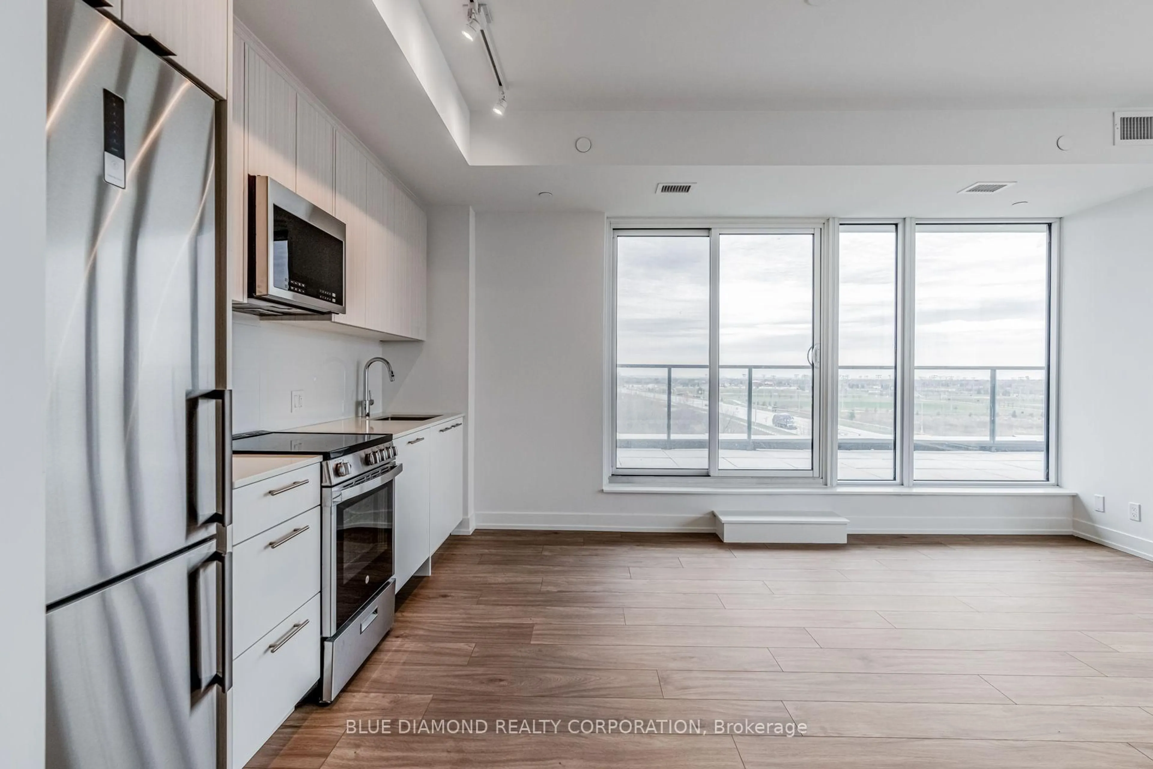 Open concept kitchen, unknown for 215 VETERANS Dr #408, Brampton Ontario L7A 5L6