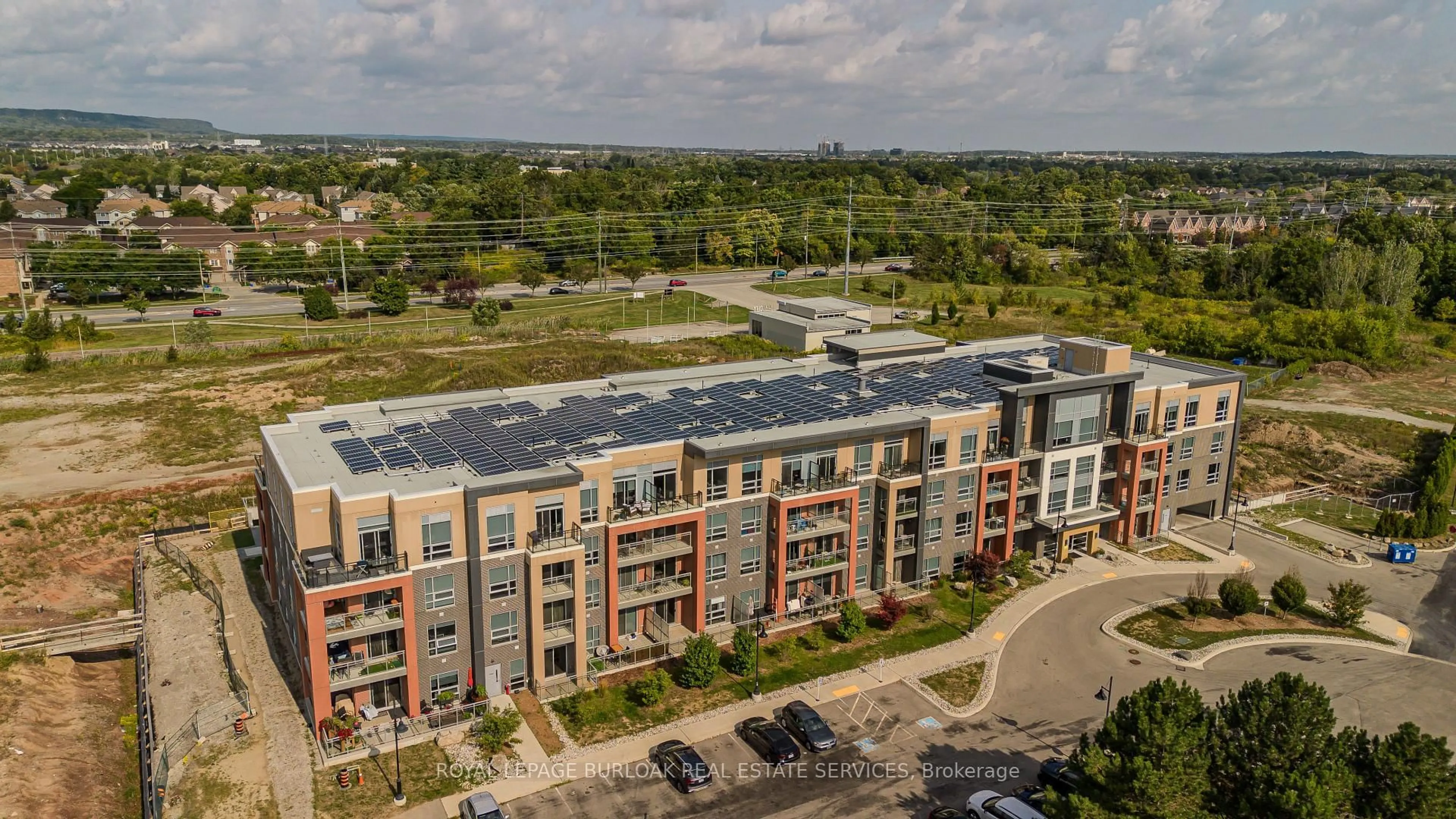 A pic from outside/outdoor area/front of a property/back of a property/a pic from drone, building for 4040 Upper Middle Rd #315, Burlington Ontario L7M 0H2