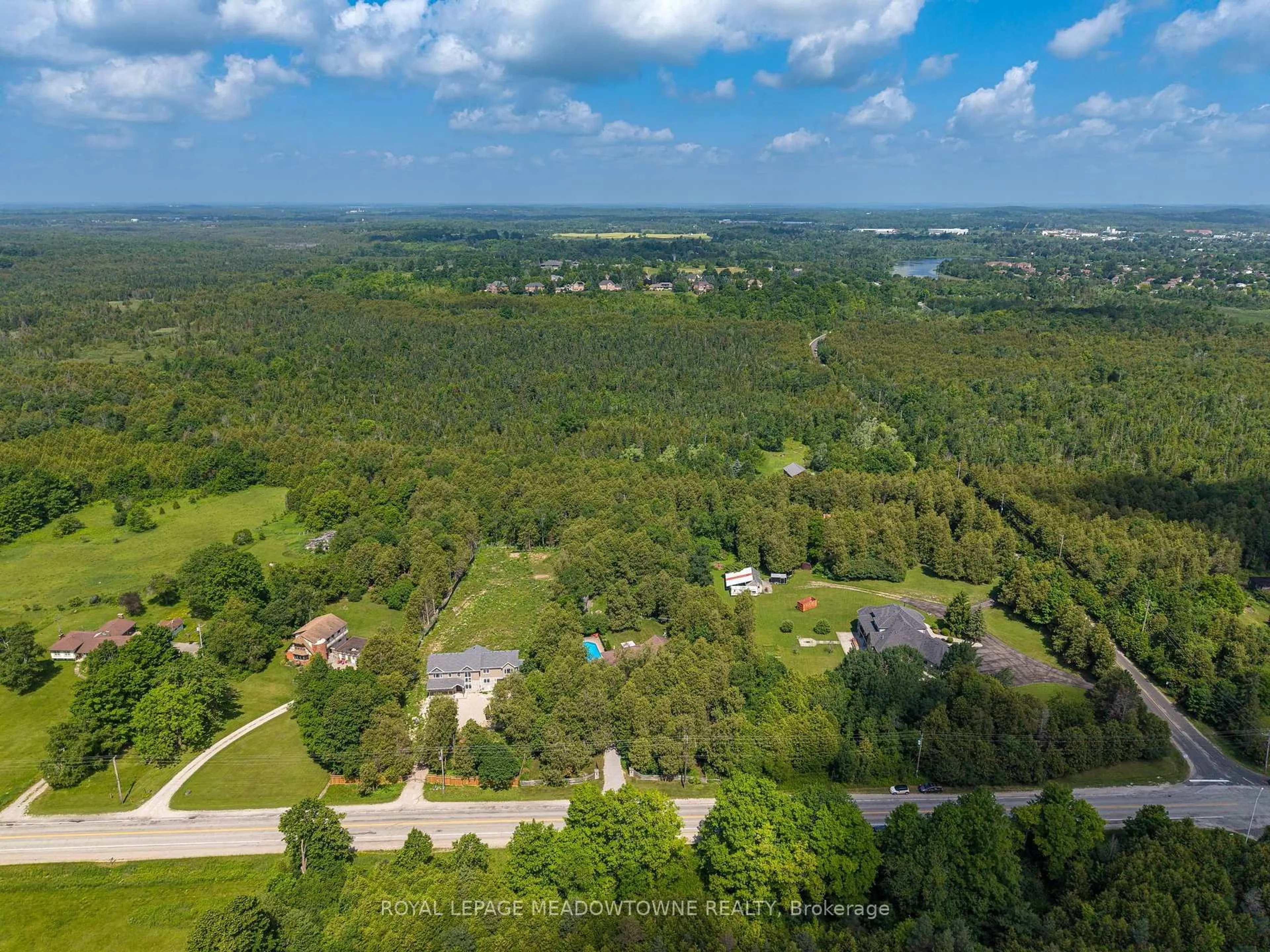 A pic from outside/outdoor area/front of a property/back of a property/a pic from drone, forest/trees view for 6733 25 Sdrd, Halton Hills Ontario L7J 2L7