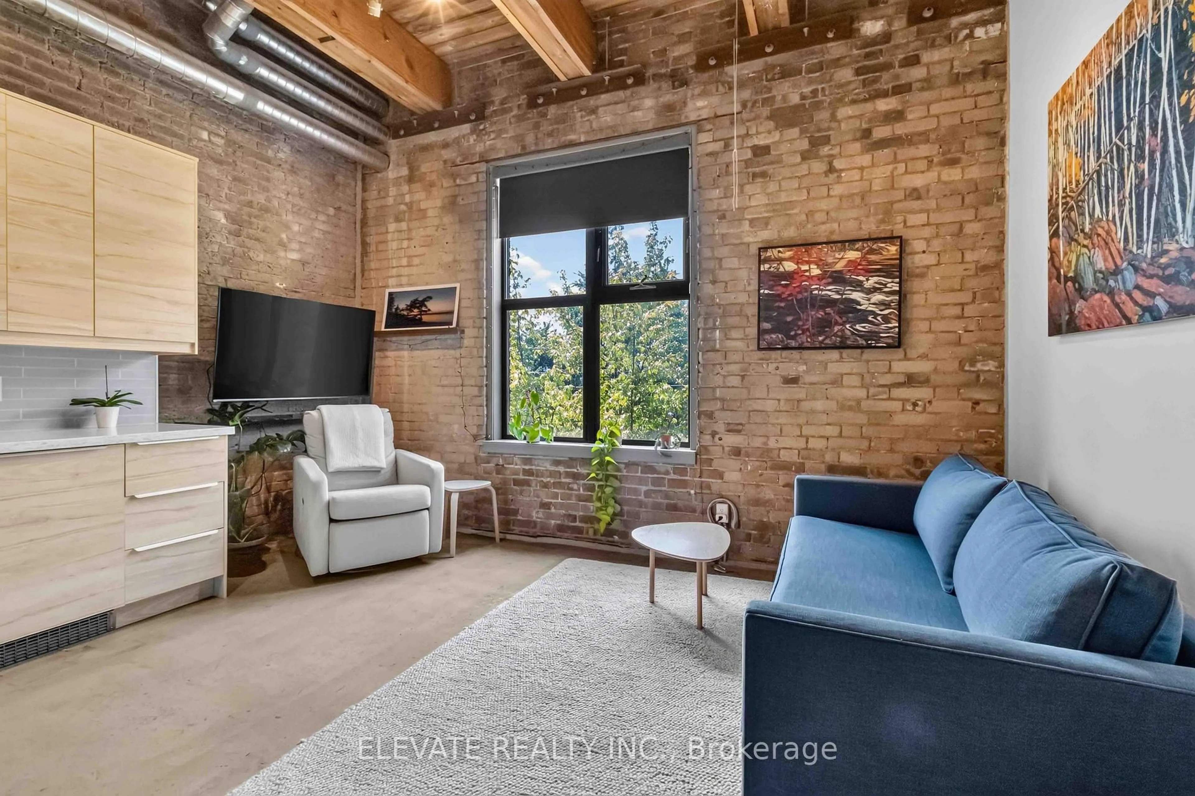 Living room with furniture, unknown for 363 Sorauren Ave #312, Toronto Ontario M6R 3C1
