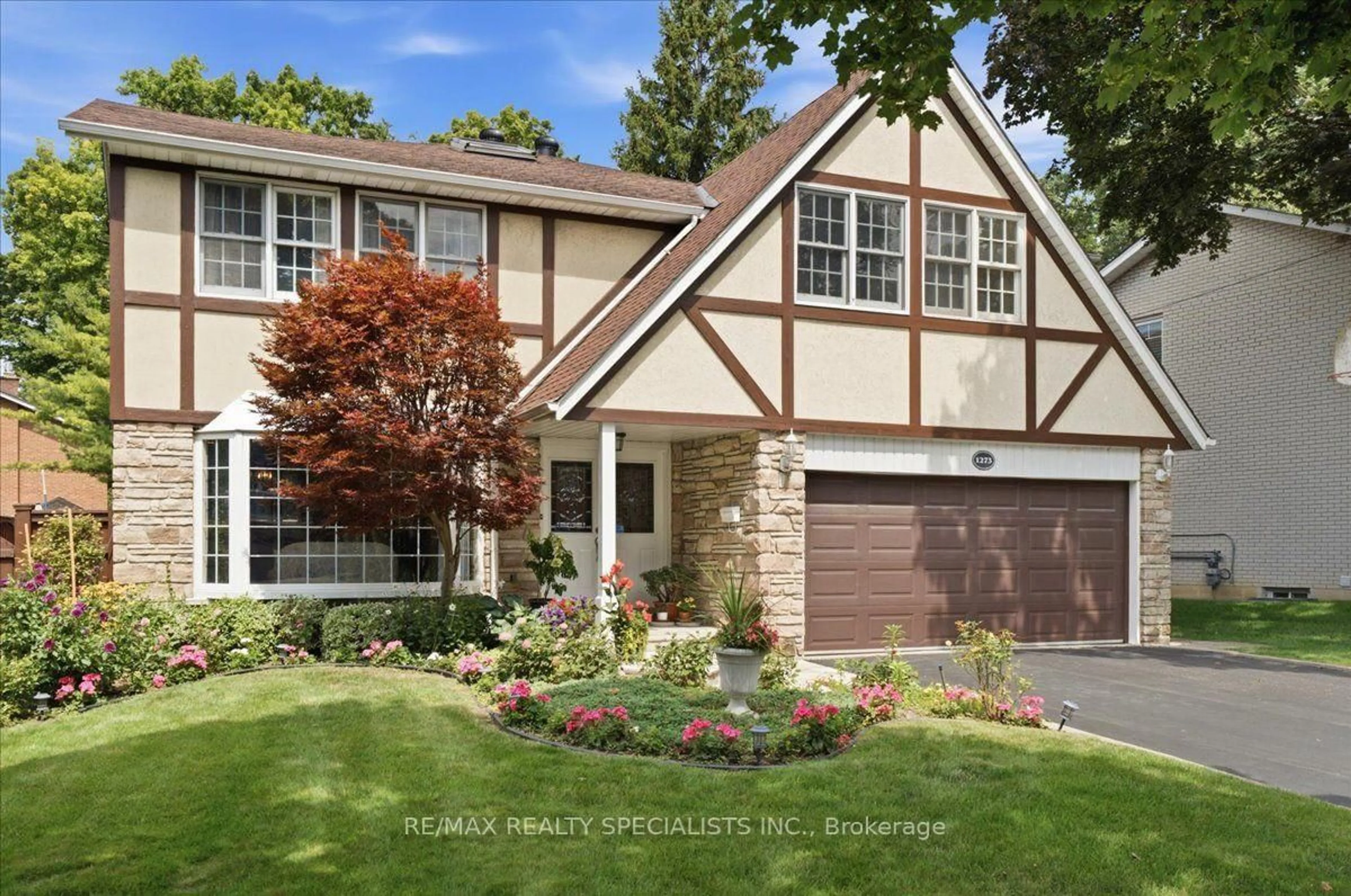 Home with brick exterior material, street for 1273 Winding Tr, Mississauga Ontario L4Y 2T9