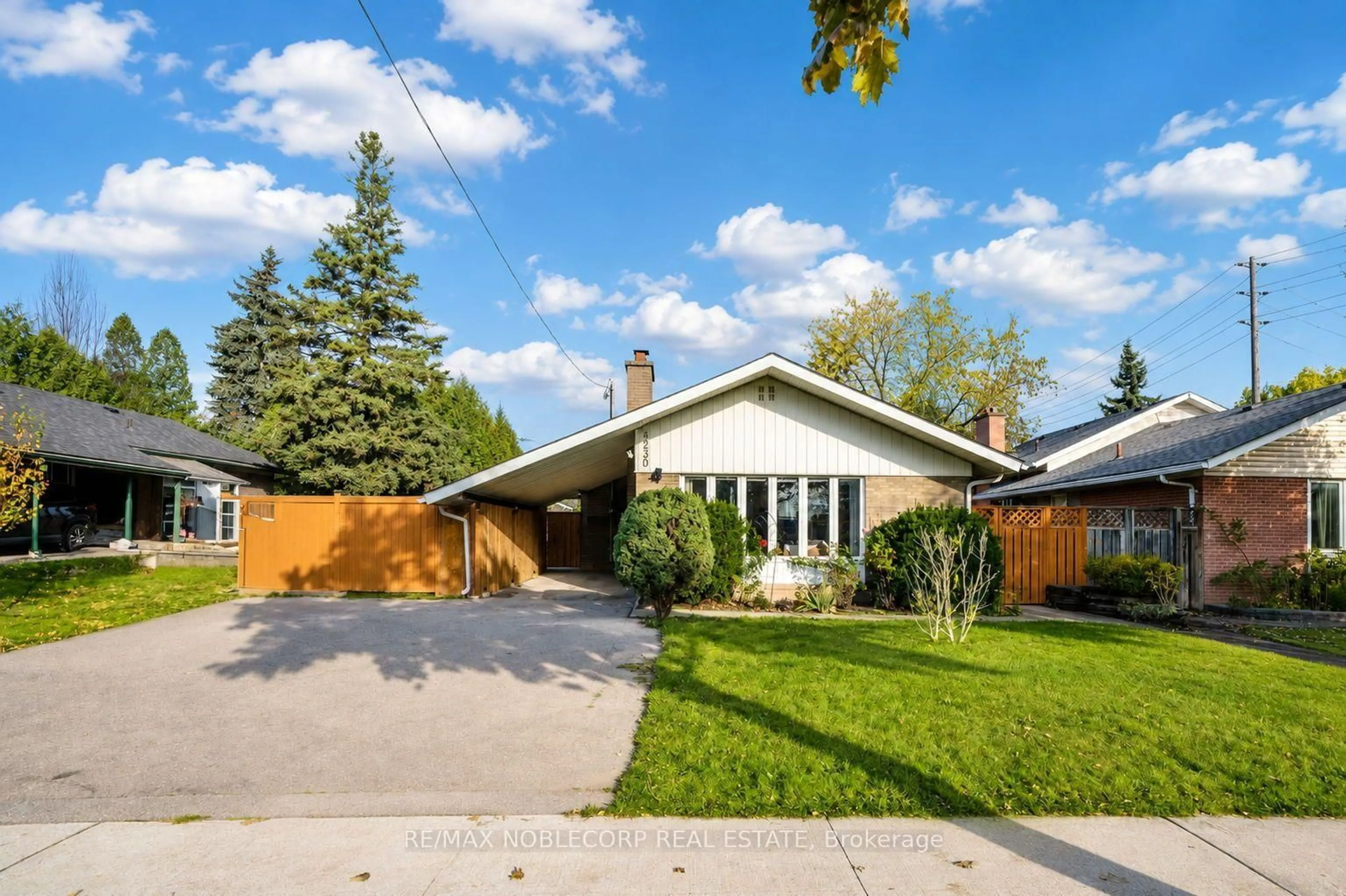 Home with vinyl exterior material, street for 4230 Bloor St, Toronto Ontario M9C 1Z7