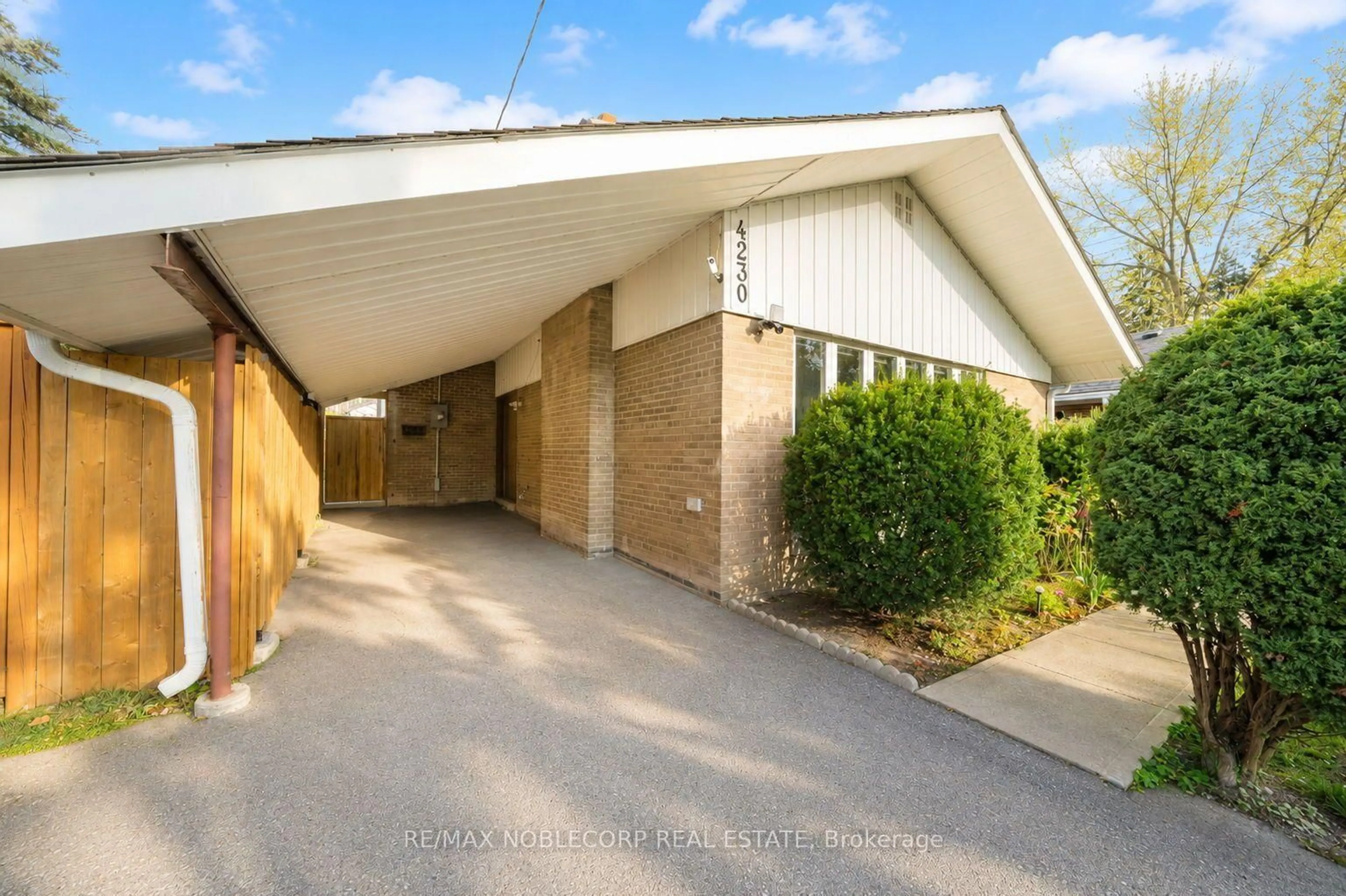 A pic from outside/outdoor area/front of a property/back of a property/a pic from drone, building for 4230 Bloor St, Toronto Ontario M9C 1Z7