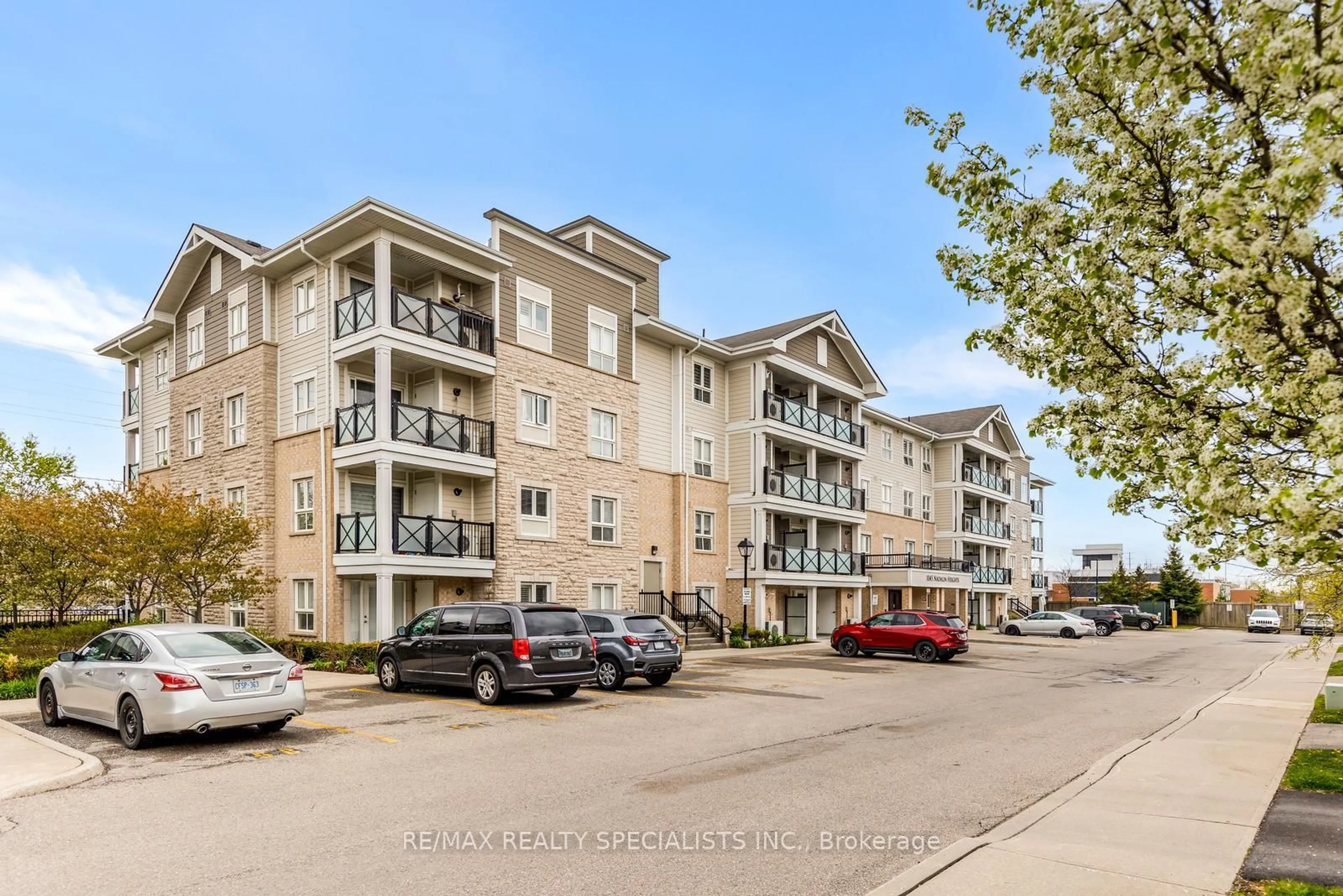 A pic from outside/outdoor area/front of a property/back of a property/a pic from drone, unknown for 1045 Nadalin Hts #209, Milton Ontario L9T 8R5