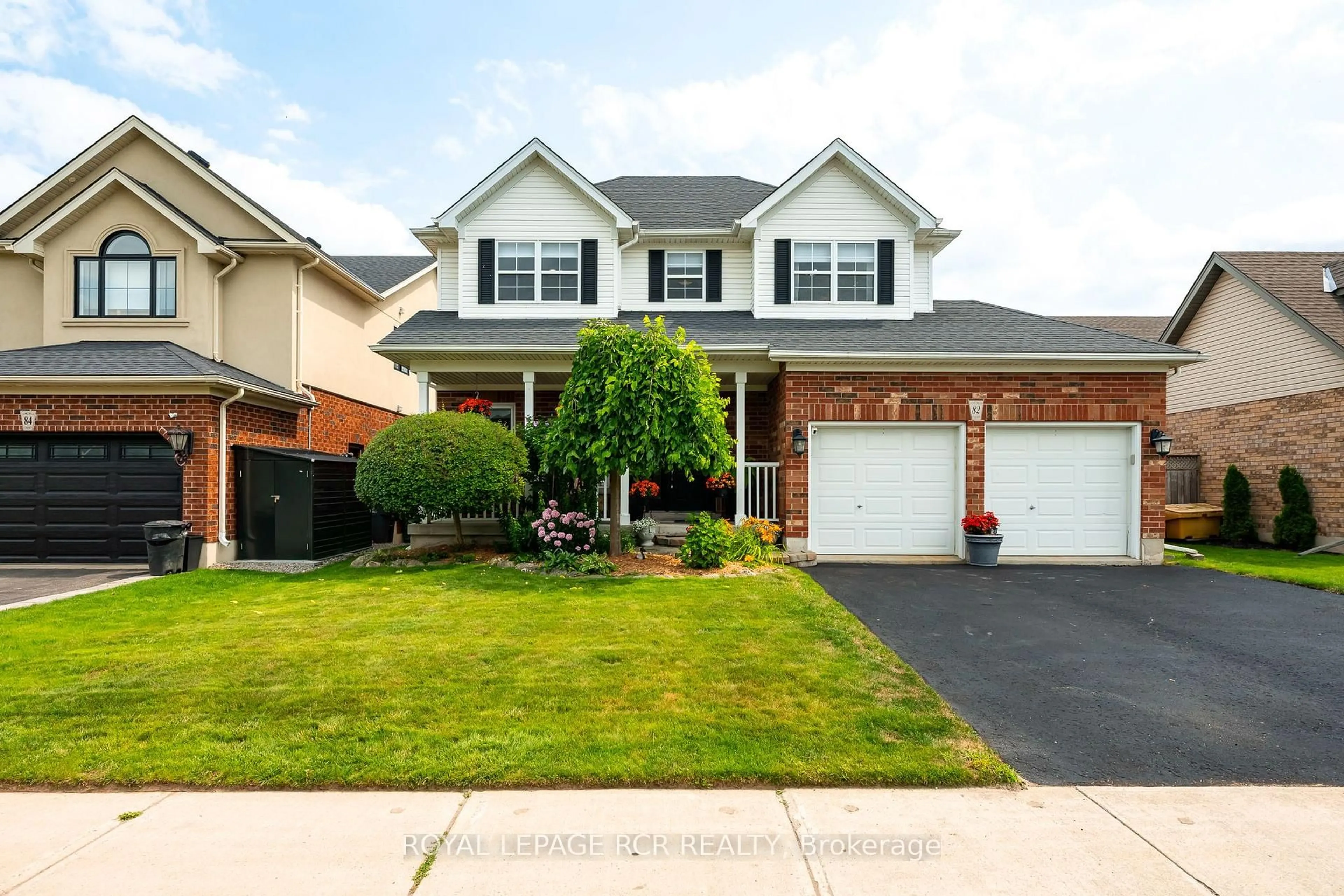 Home with brick exterior material, street for 82 Spencer Ave, Orangeville Ontario L9W 5H8