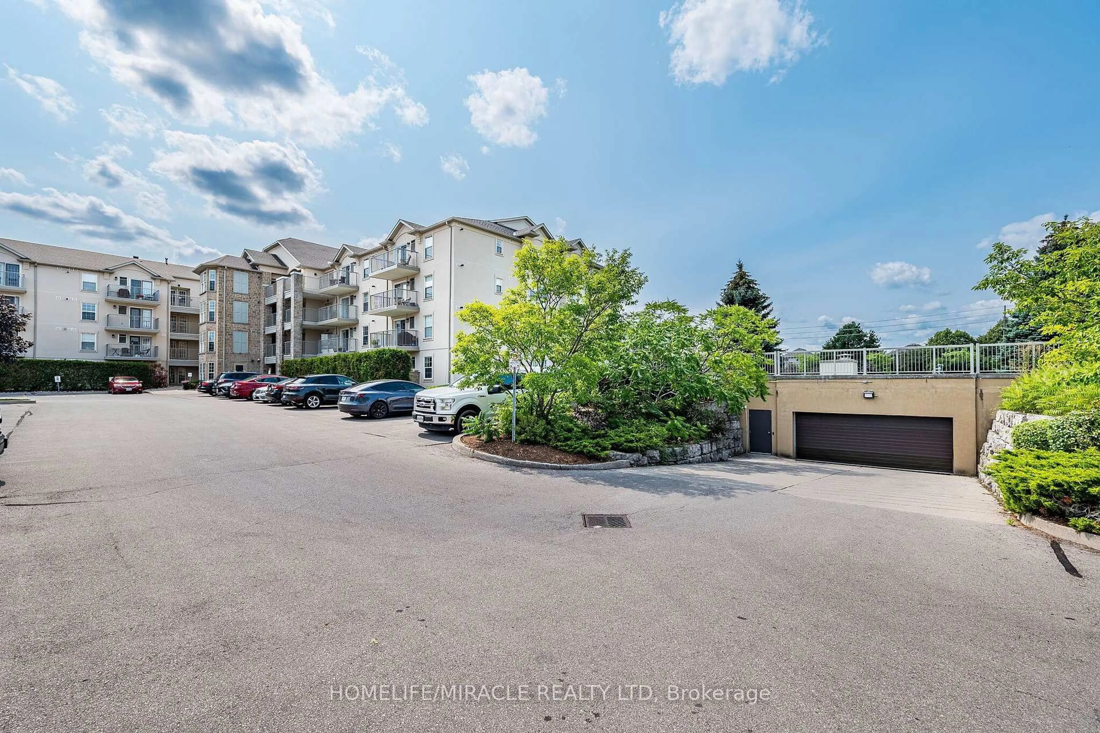 A pic from outside/outdoor area/front of a property/back of a property/a pic from drone, unknown for 1490 Bishops Gate #305, Oakville Ontario L6M 4N3