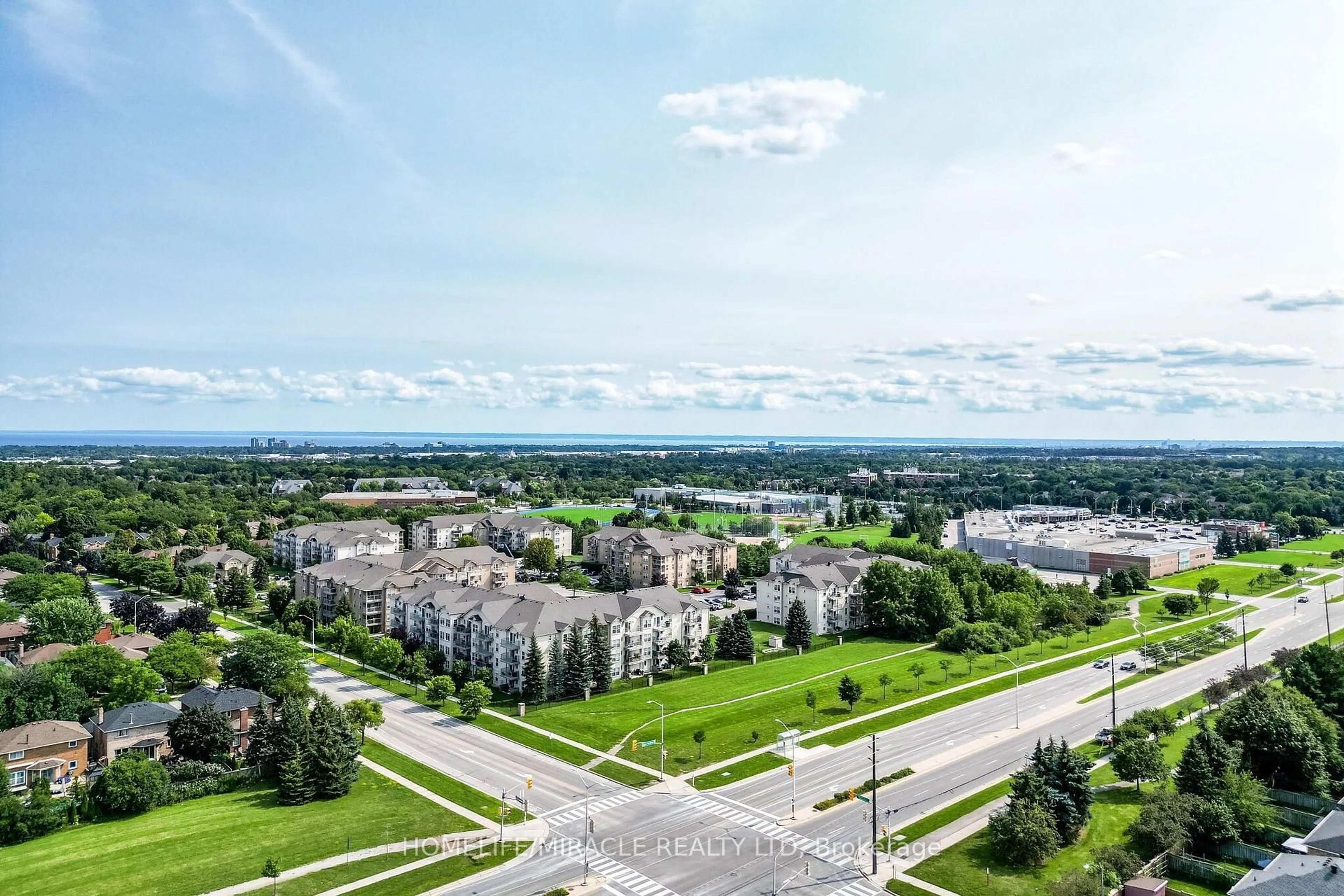 A pic from outside/outdoor area/front of a property/back of a property/a pic from drone, city buildings view from balcony for 1490 Bishops Gate #305, Oakville Ontario L6M 4N3