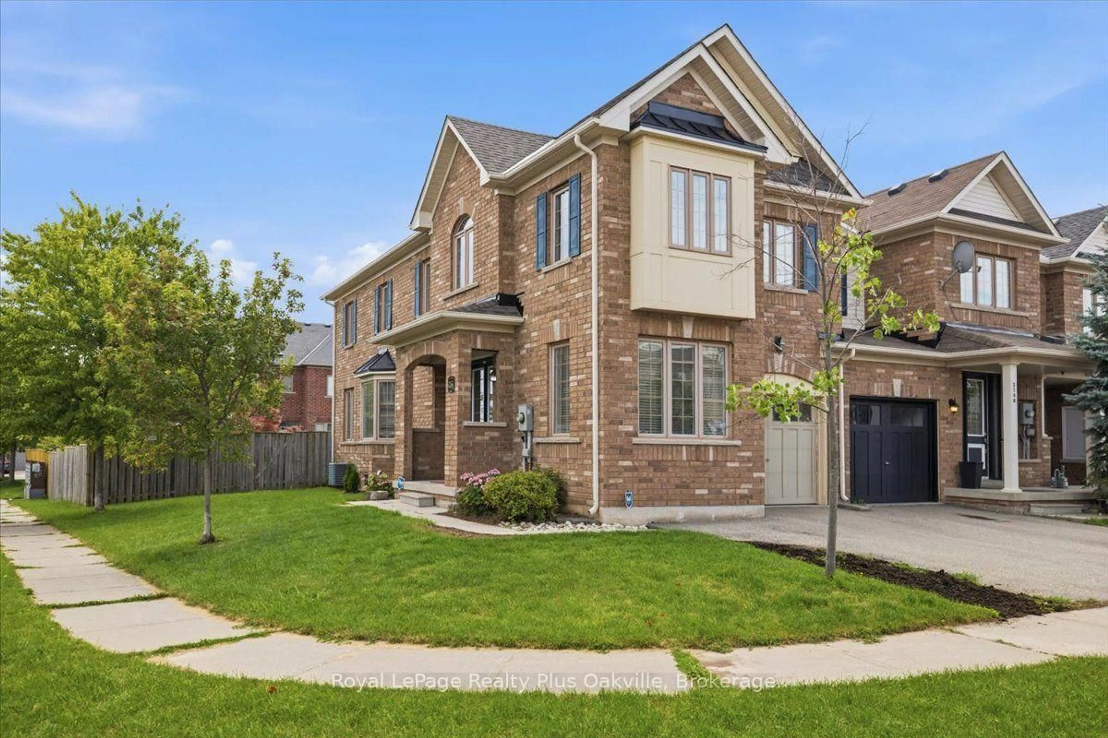Home with brick exterior material, street for 2146 Fiddlers Way, Oakville Ontario L6M 0M5