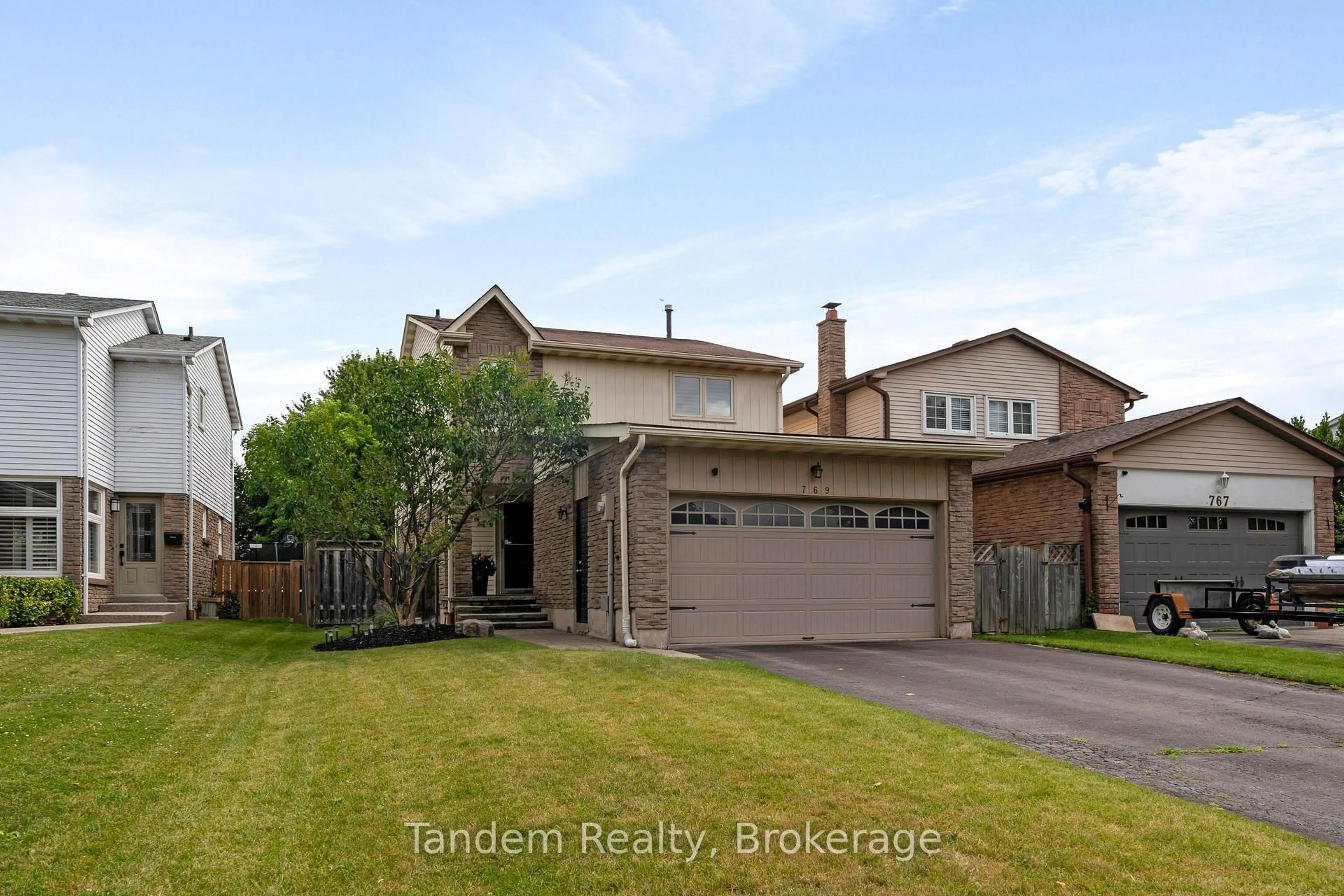 A pic from outside/outdoor area/front of a property/back of a property/a pic from drone, street for 769 Coulson Ave, Milton Ontario L9T 4K2
