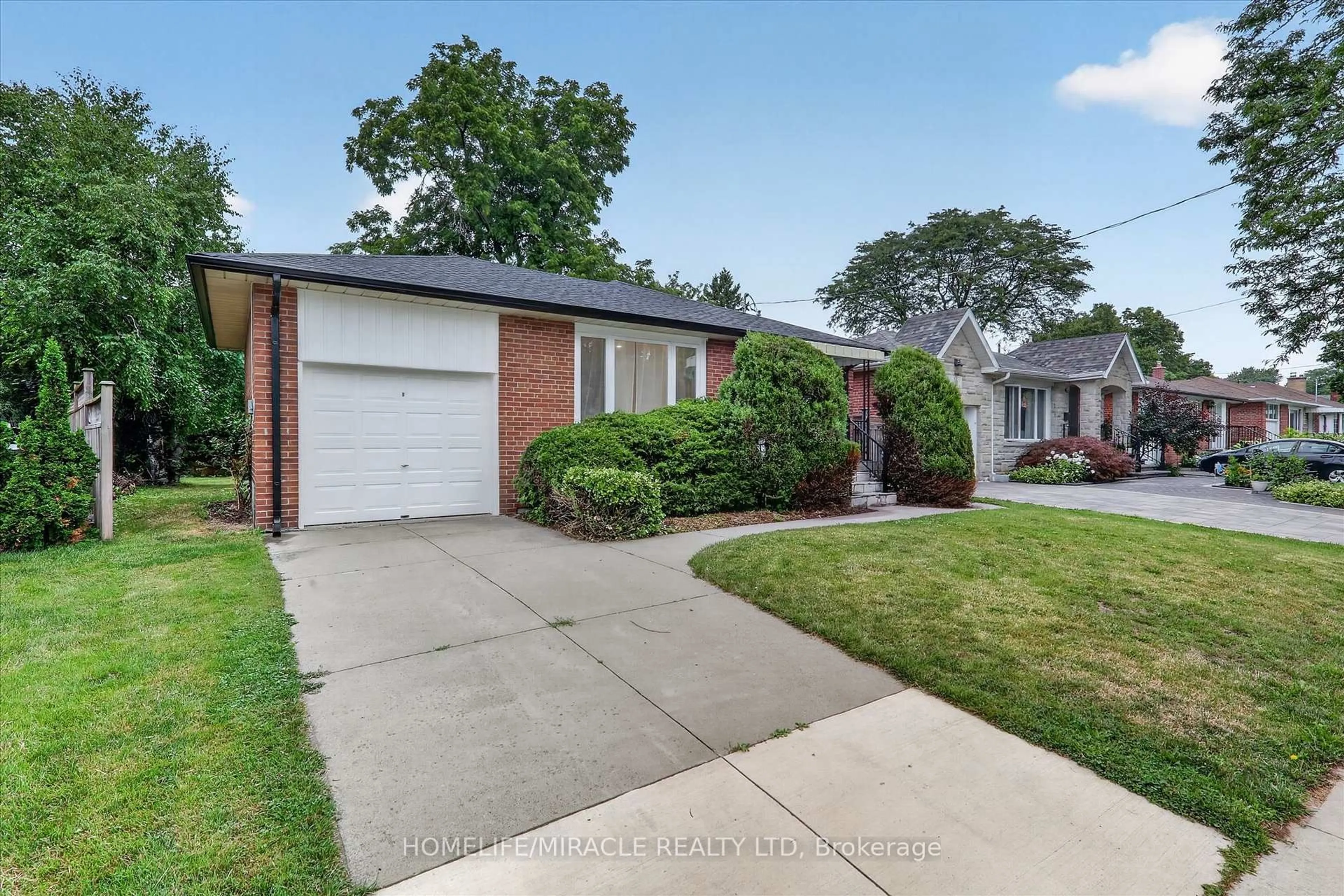 Home with brick exterior material, street for 18 Elderfield Cres, Toronto Ontario M9C 3K7