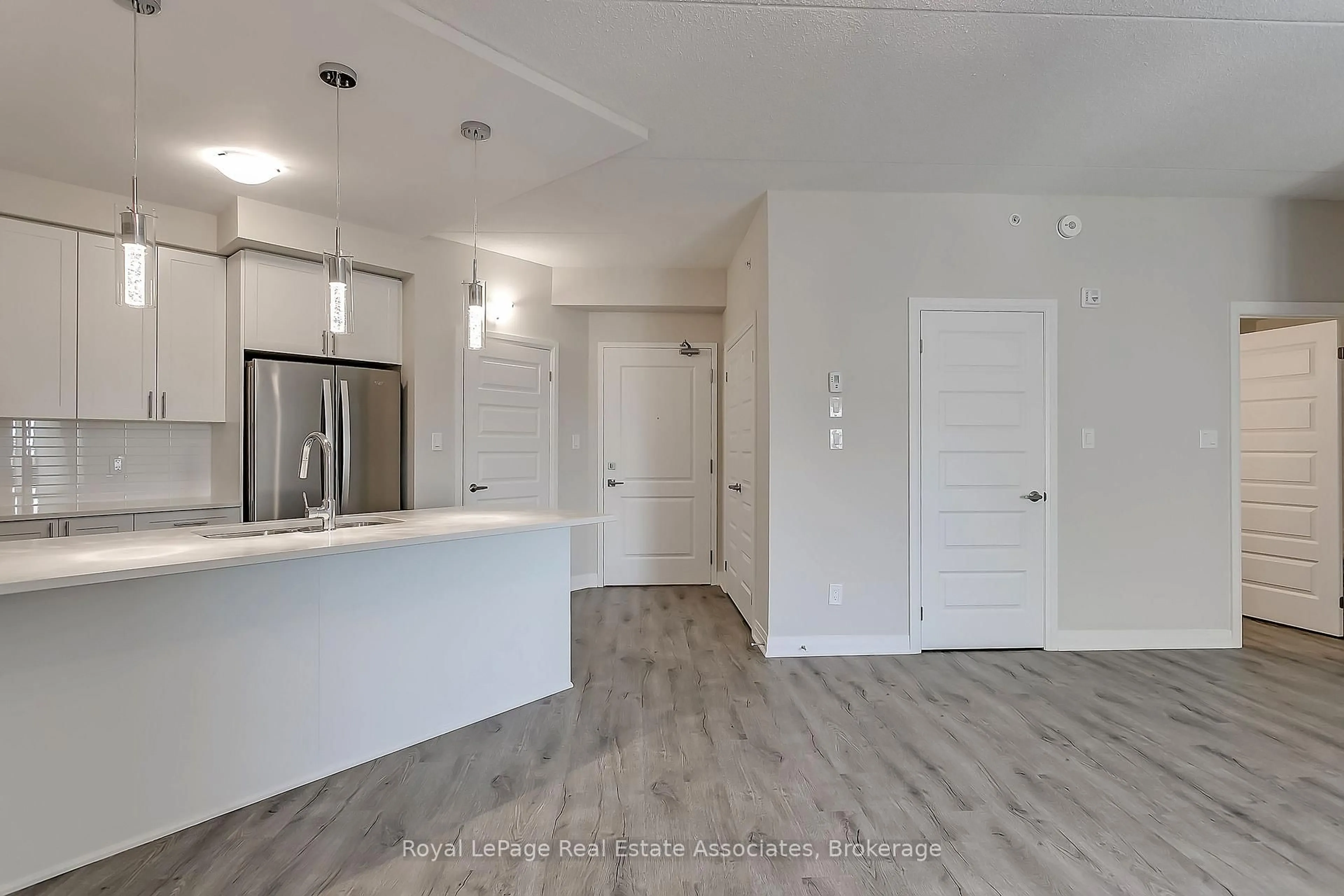 Open concept kitchen, unknown for 610 Farmstead Dr #524, Milton Ontario L9T 8X5