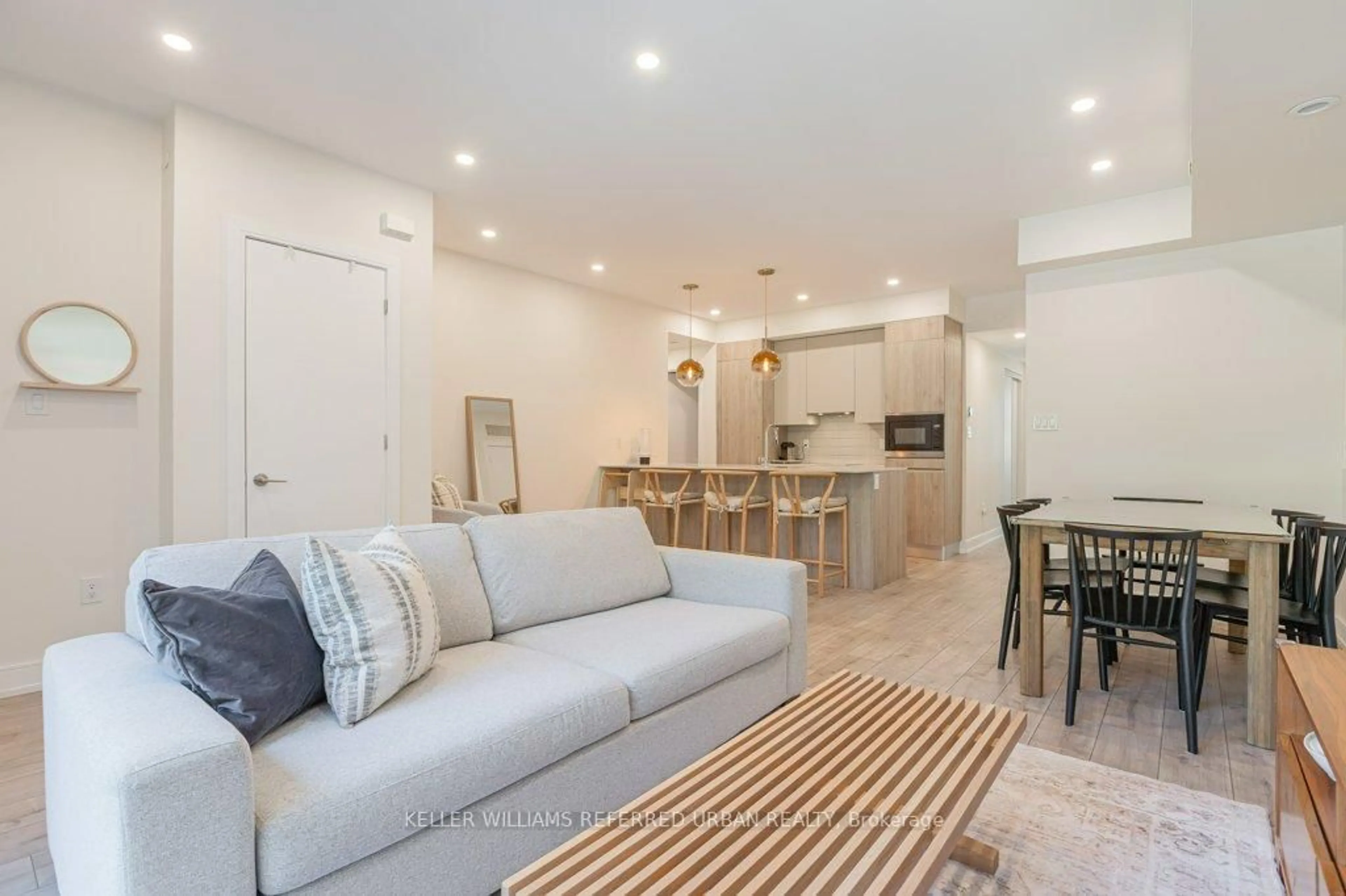 Living room with furniture, unknown for 66 Long Branch Ave #6, Toronto Ontario M8W 3J4