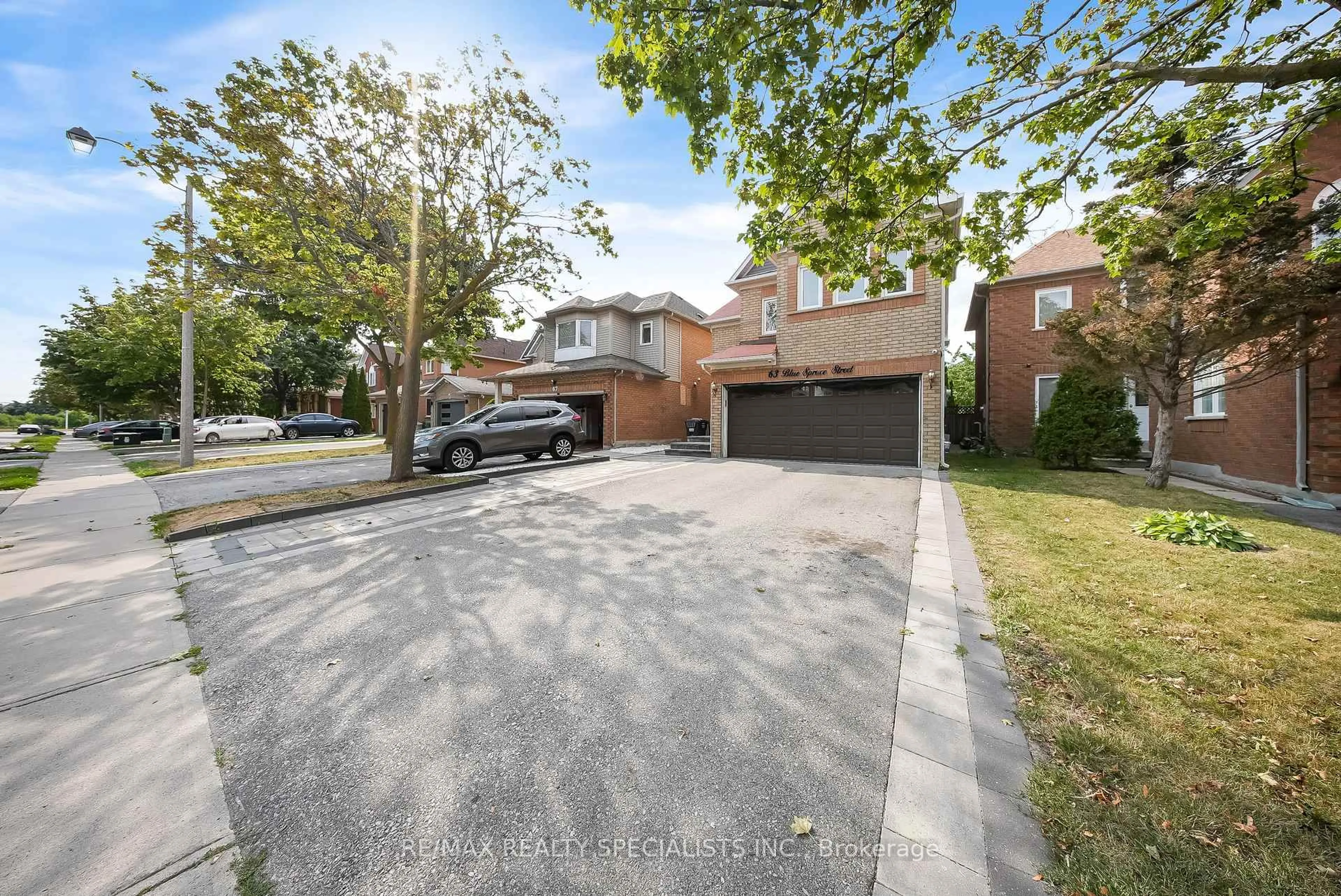 A pic from outside/outdoor area/front of a property/back of a property/a pic from drone, street for 63 Blue Spruce St, Brampton Ontario L6R 1C4