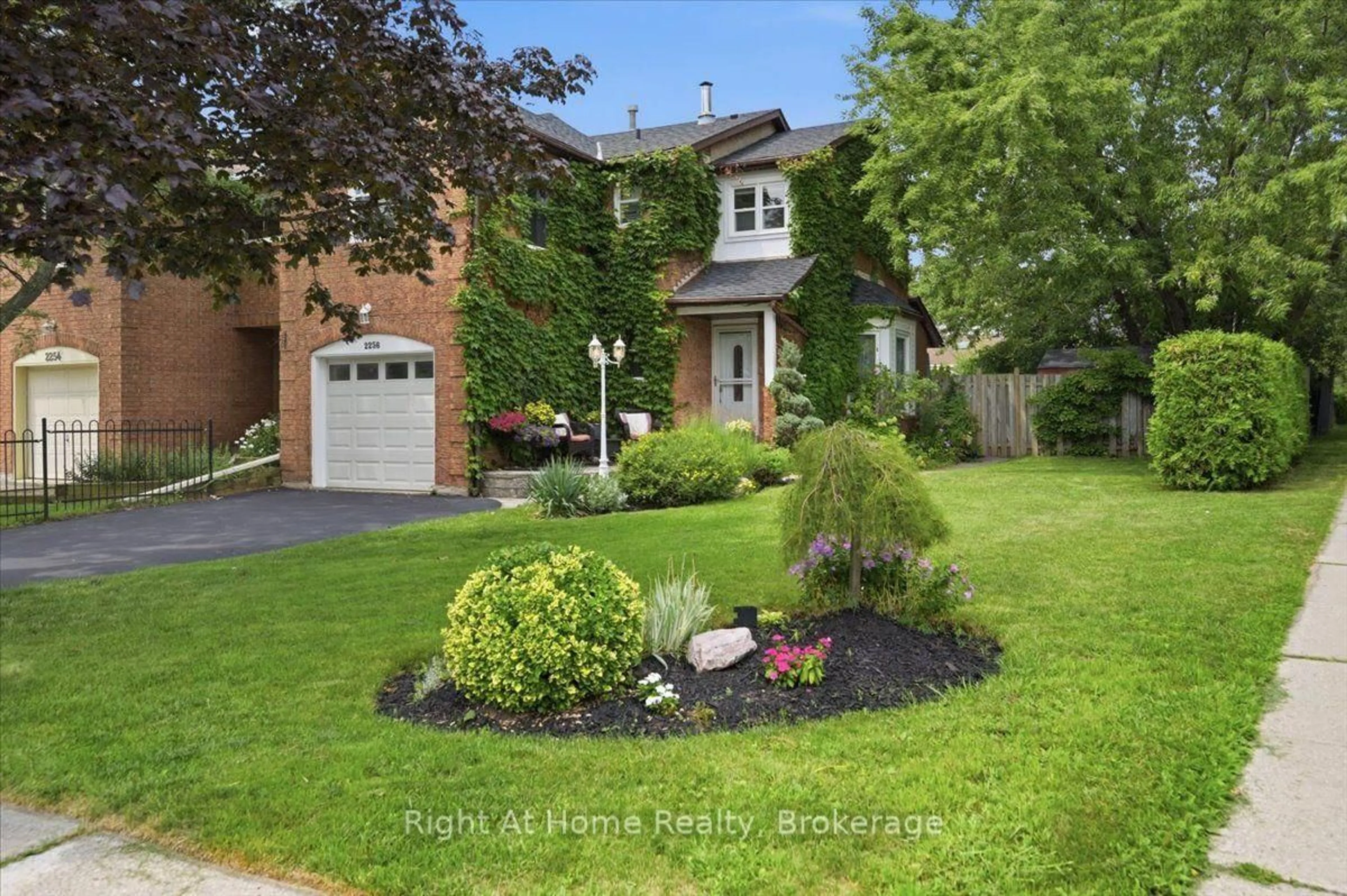 Home with brick exterior material, street for 2256 Munns Ave, Oakville Ontario L6H 3M8
