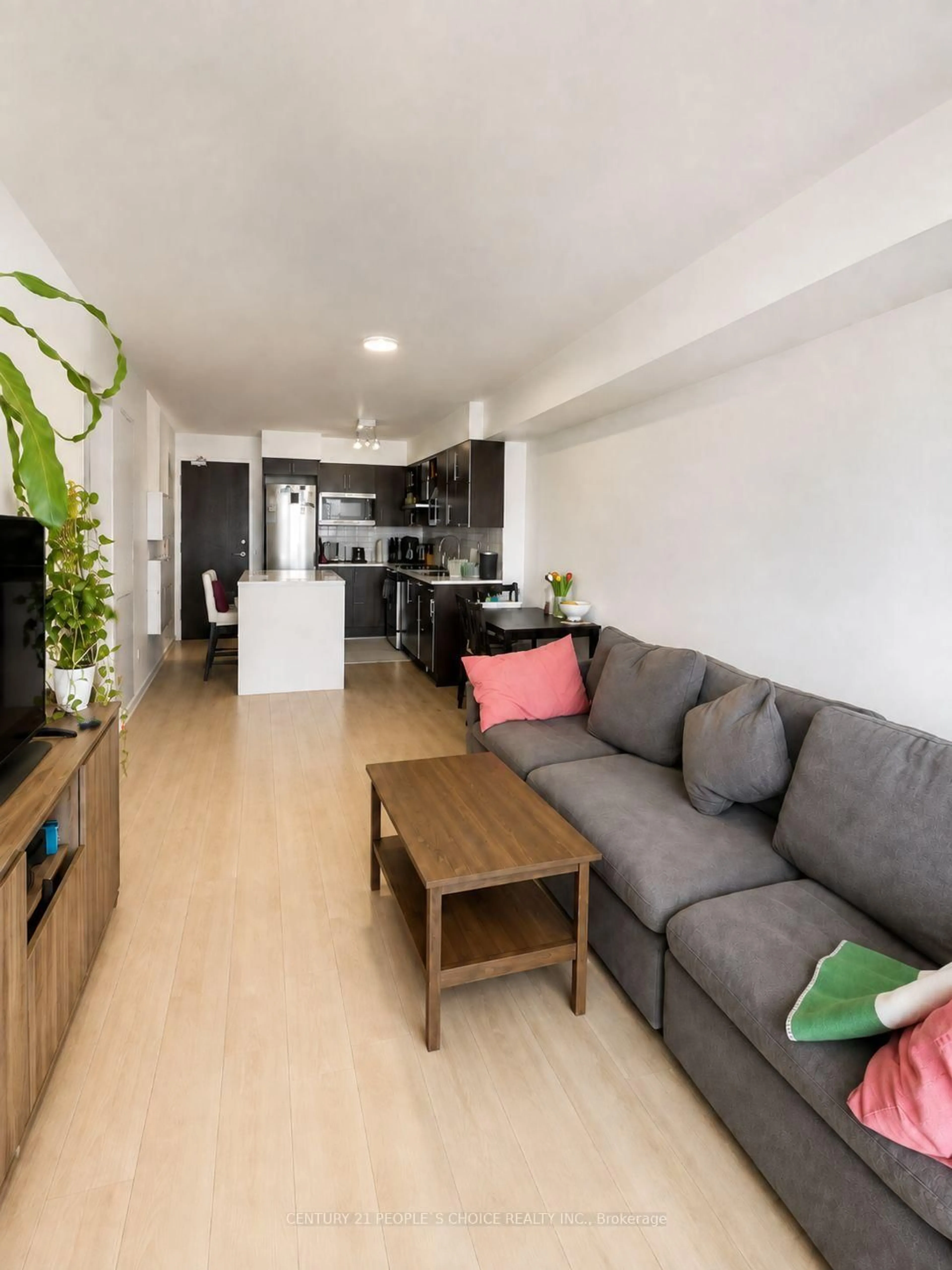 Living room with furniture, wood/laminate floor for 1 Michael Power Pl #809, Toronto Ontario M9A 0A1