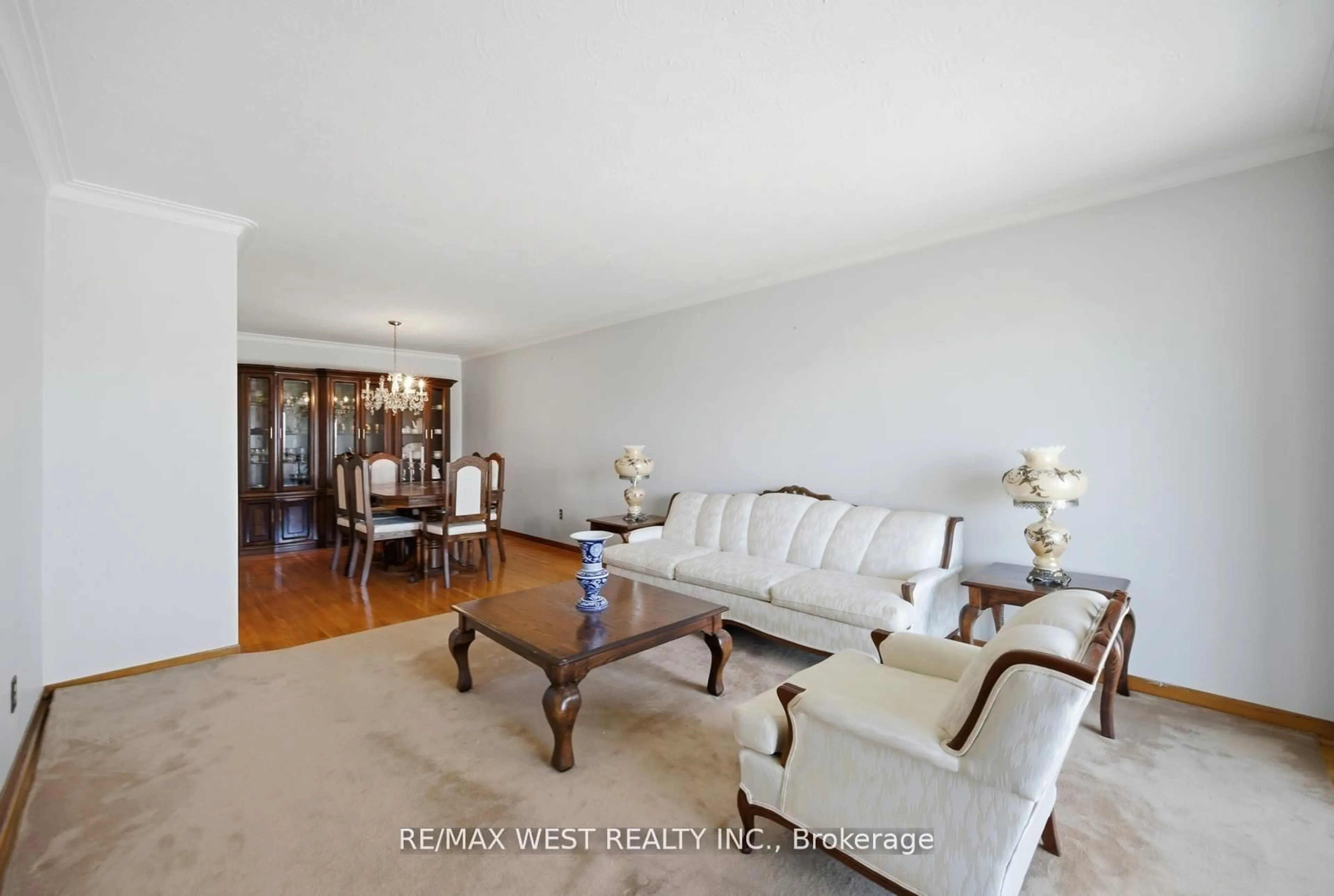 Living room with furniture, wood/laminate floor for 111 Shoreham Dr, Toronto Ontario M3N 1S8