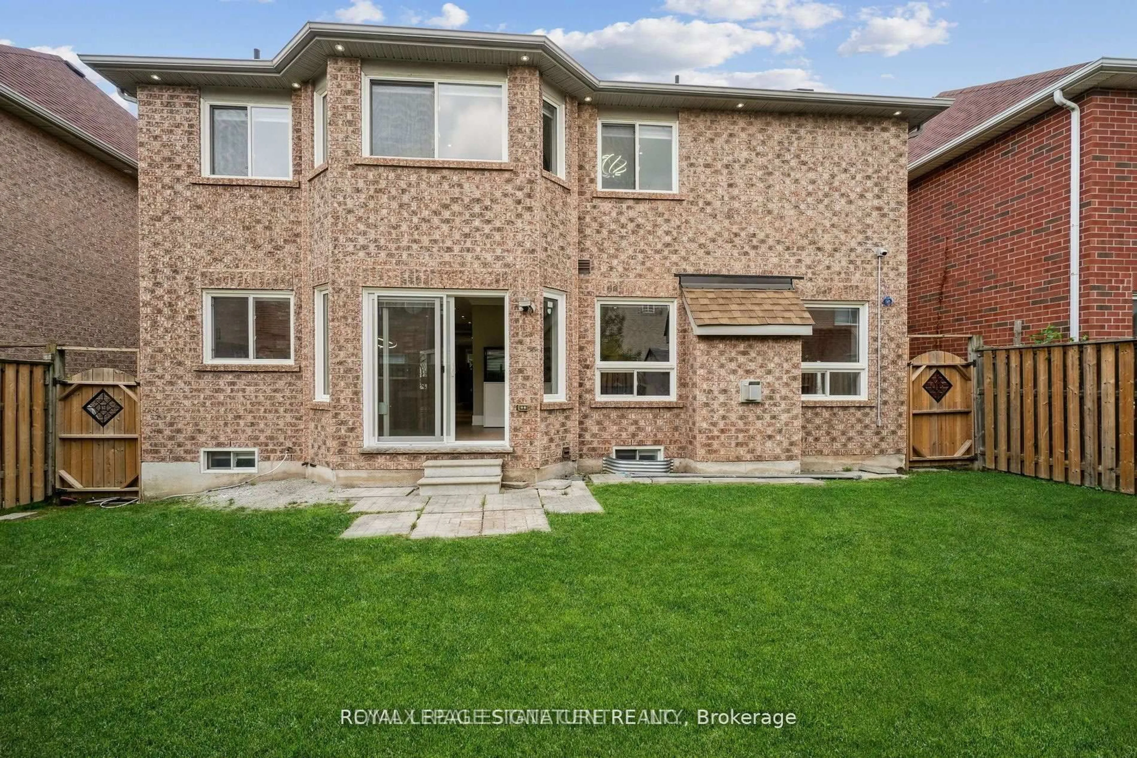 Home with brick exterior material, street for 12 Ferncroft Pl, Brampton Ontario L7A 2Z6
