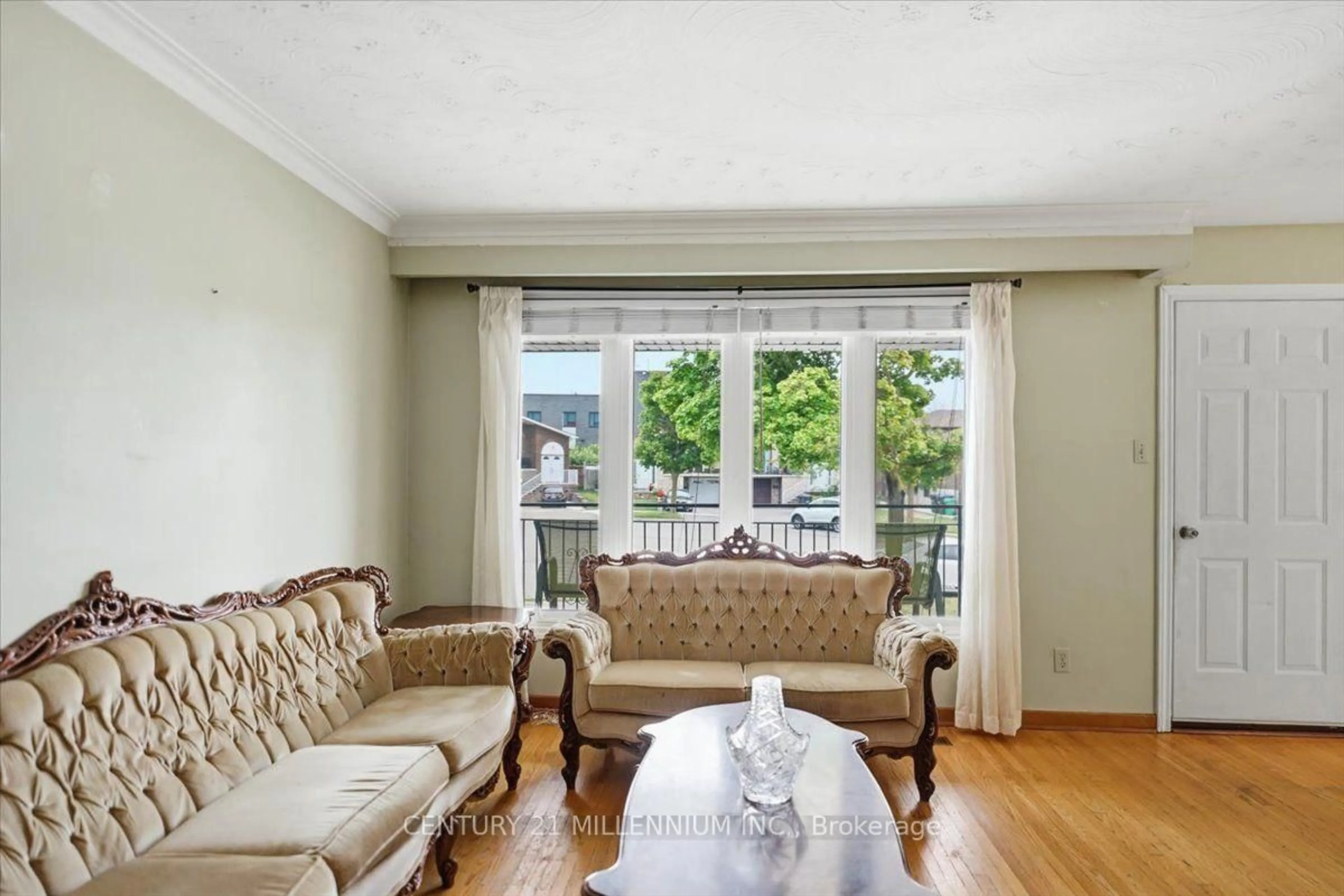 Living room with furniture, wood/laminate floor for 9 Cheryl Crt, Brampton Ontario L6V 3C2