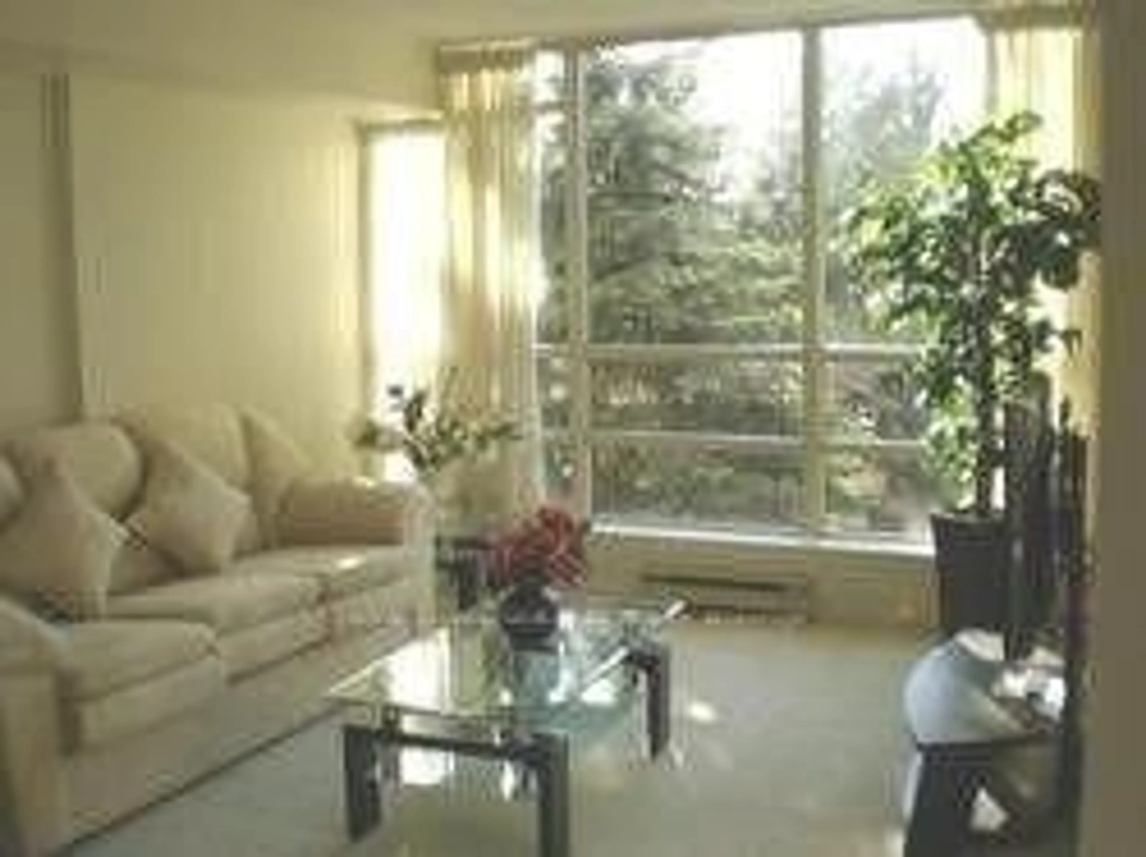 Living room with furniture, unknown for 45 Kingsbridge Garden Circ #201, Mississauga Ontario L5R 3K4