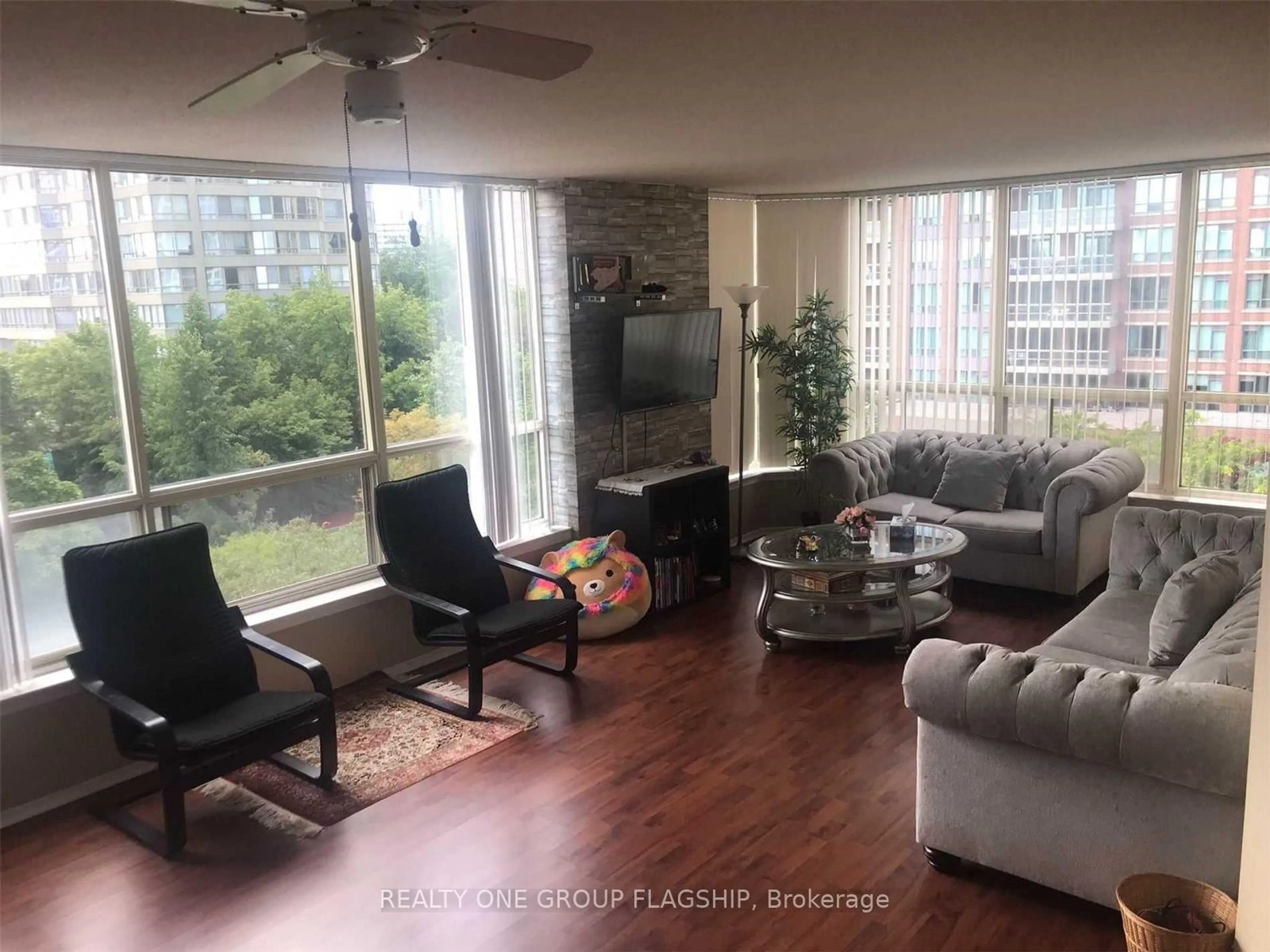 Living room with furniture, unknown for 55 Elm Dr #604, Mississauga Ontario L5B 3Z3
