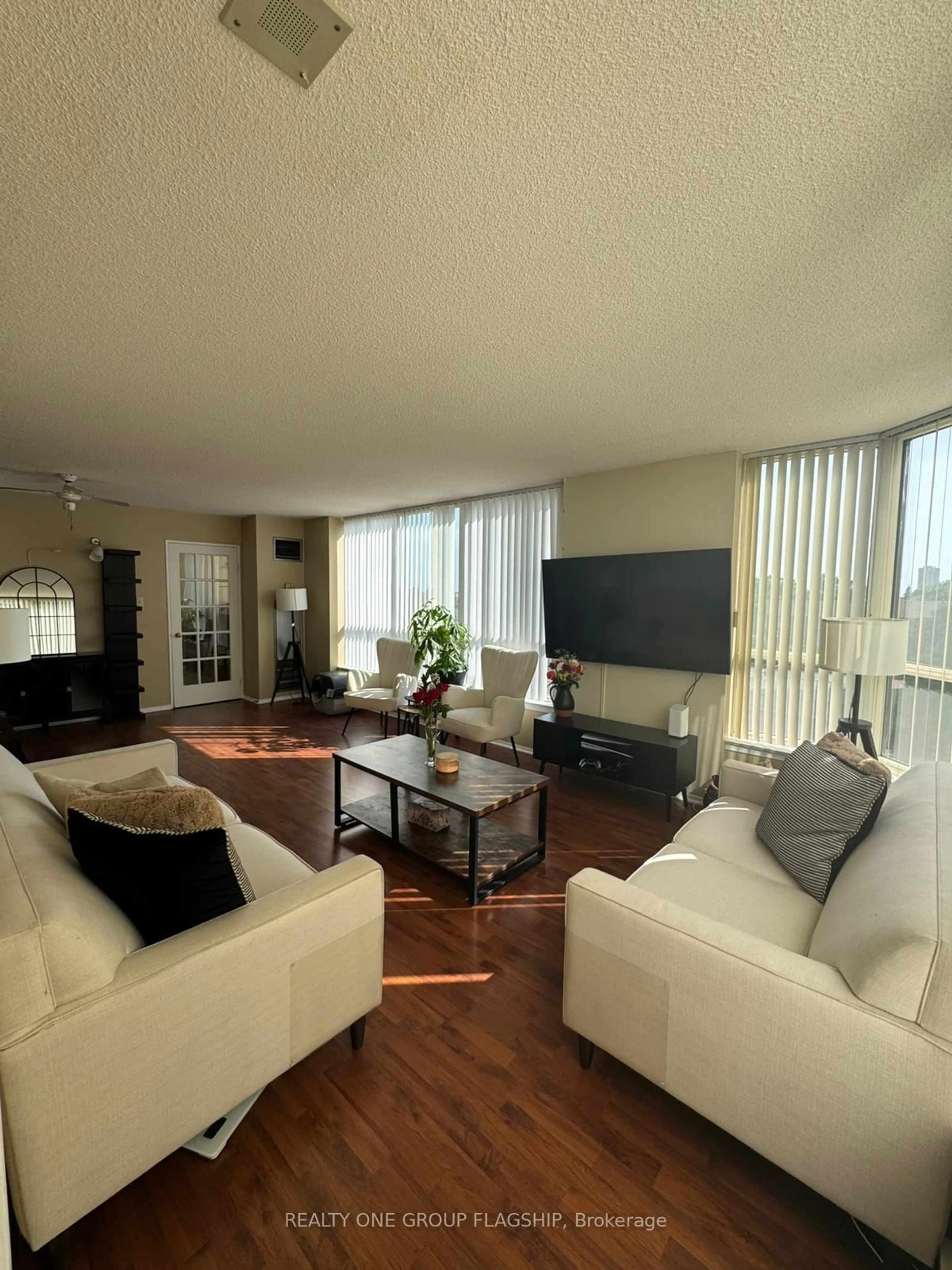 Living room with furniture, unknown for 55 Elm Dr #604, Mississauga Ontario L5B 3Z3