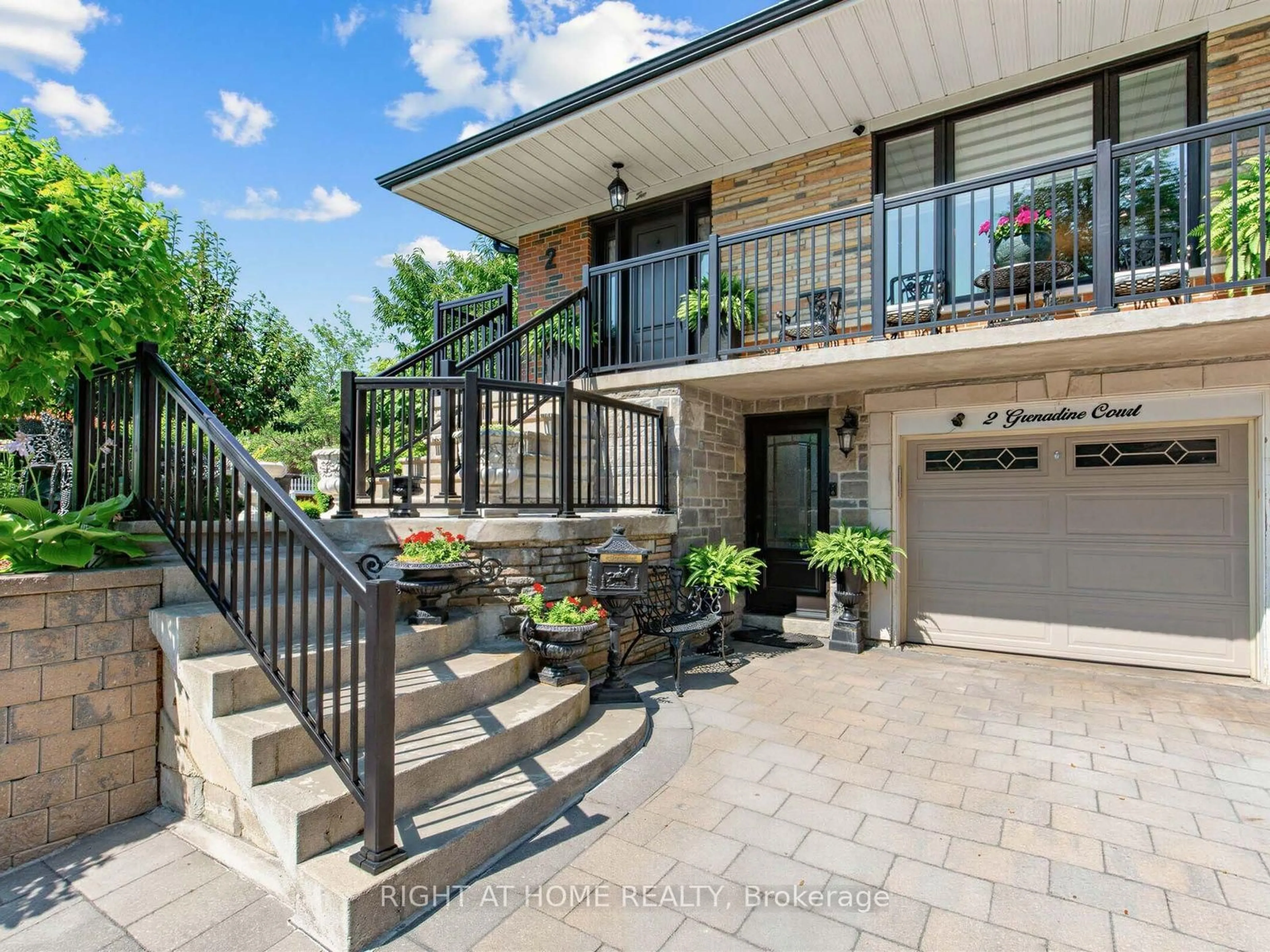 Home with brick exterior material, street for 2 Grenadine Crt, Toronto Ontario M9L 2H6