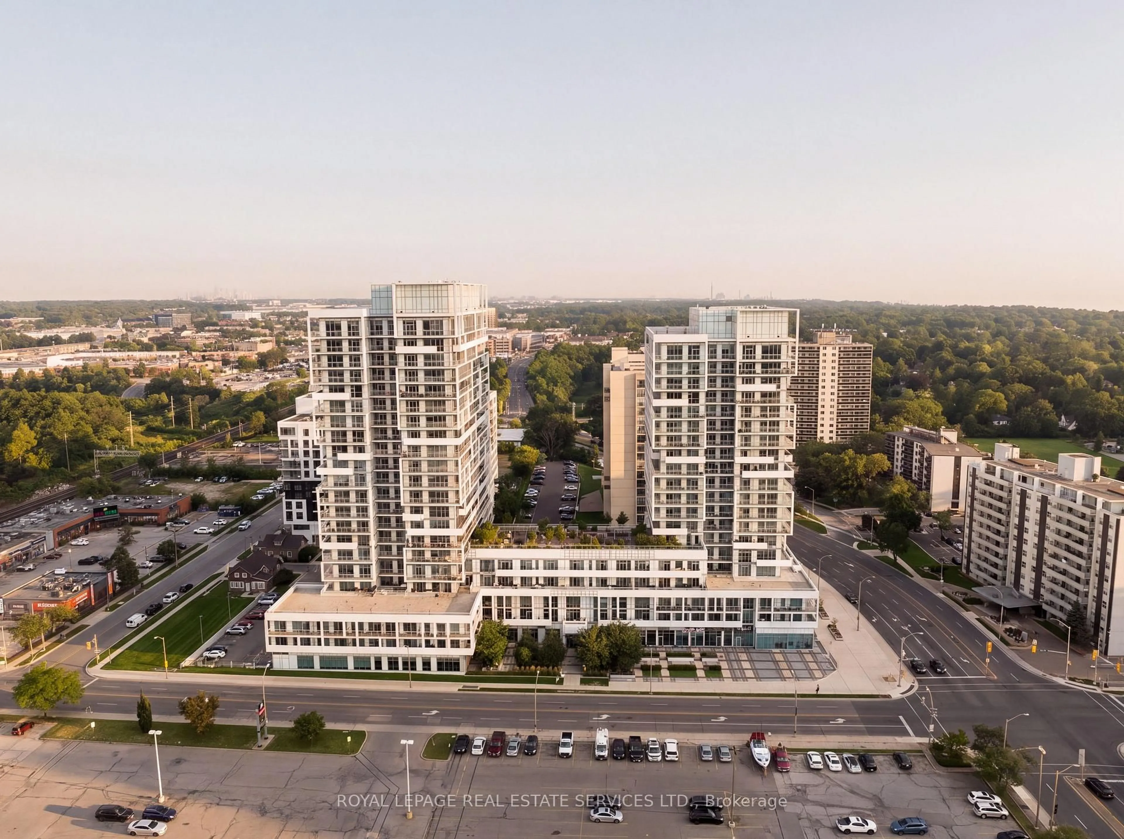 A pic from outside/outdoor area/front of a property/back of a property/a pic from drone, city buildings view from balcony for 55 Speers Rd #1310, Oakville Ontario L5K 3R6