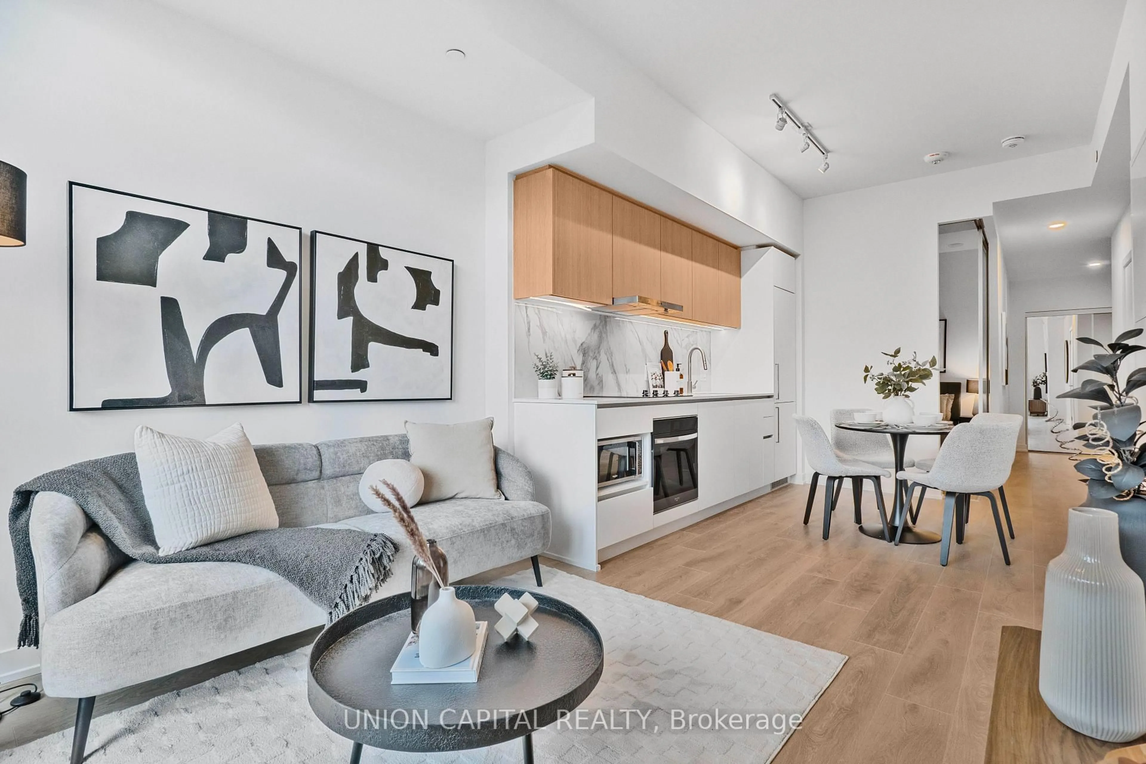 Open concept kitchen, wood/laminate floor for 1100 Sheppard Ave #302, Toronto Ontario M3K 0E4